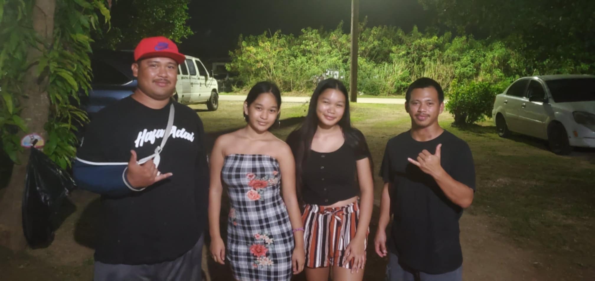 JD Delos Santos (in red cap) with his family.