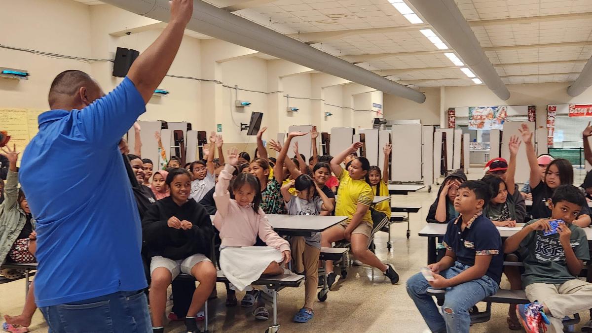 Students at Koblerville Elementary School respond during in a presentation about tourism by the Marianas Tourism Education Council and the Marianas Visitors Authority on Dec. 18, 2024, at the school in Koblerville, Saipan.