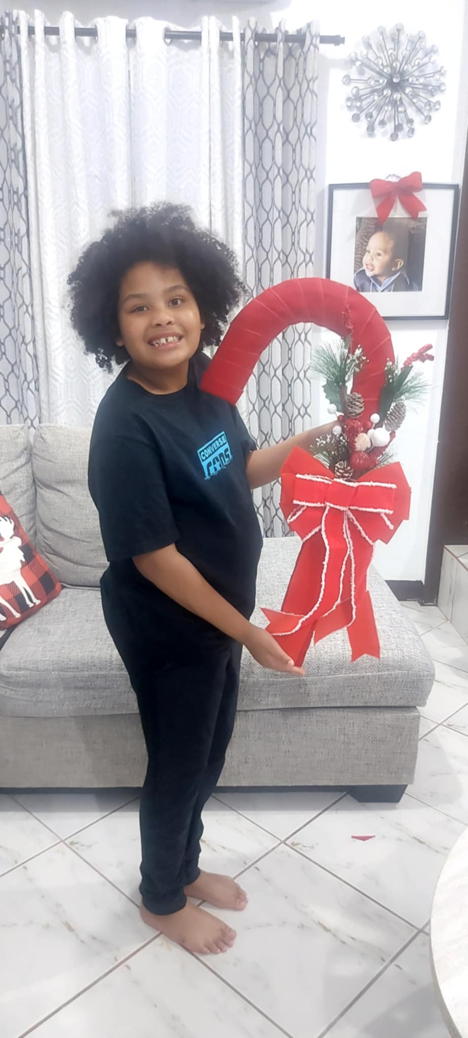 Willie James Reyes Watson, Arlene Reyes' little Santa Helper.