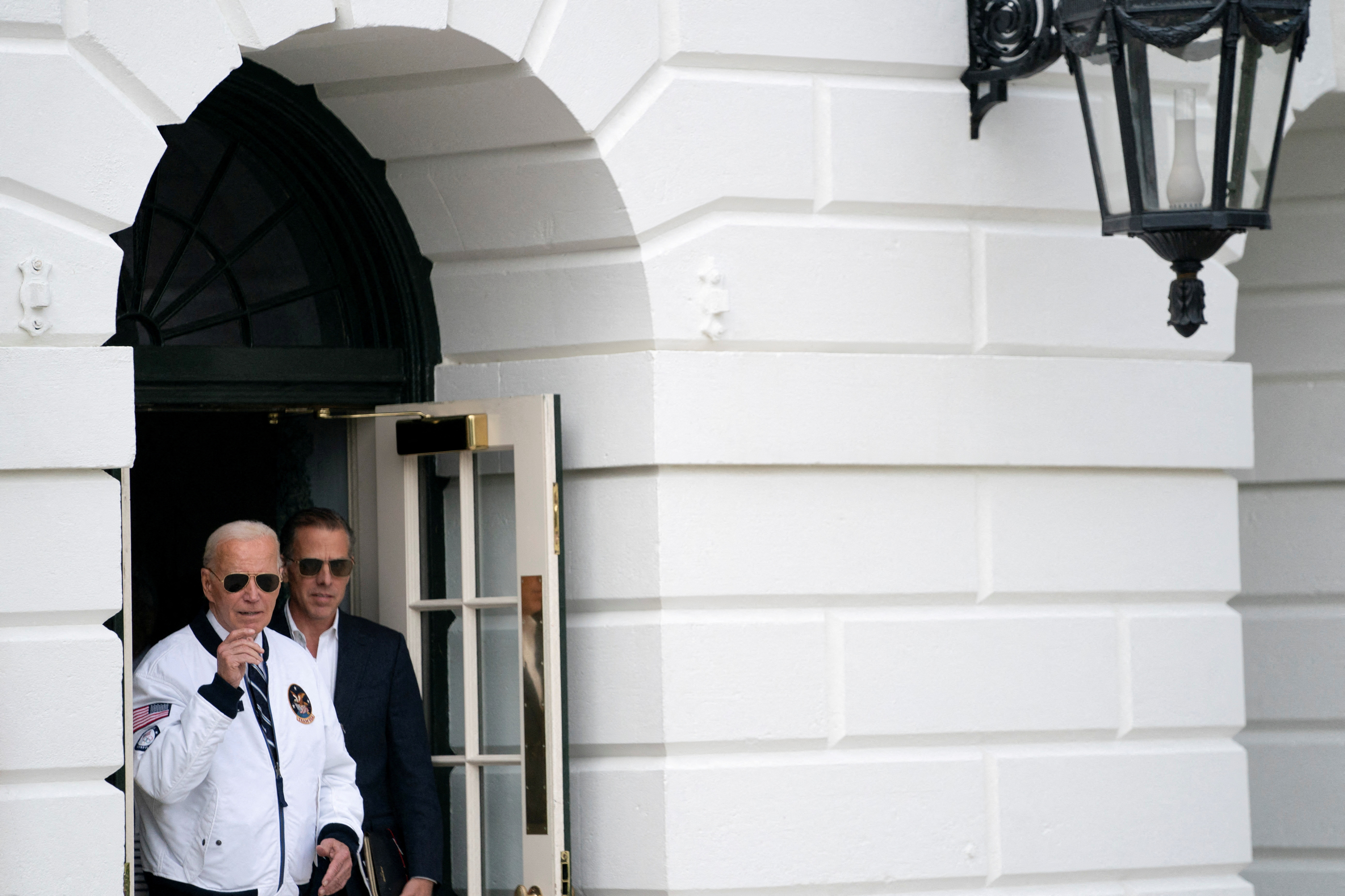 President Joe Biden departs from the South Lawn of the White House alongside his son Hunter Biden en route to Camp David, Washington, D.C., July 26, 2024.