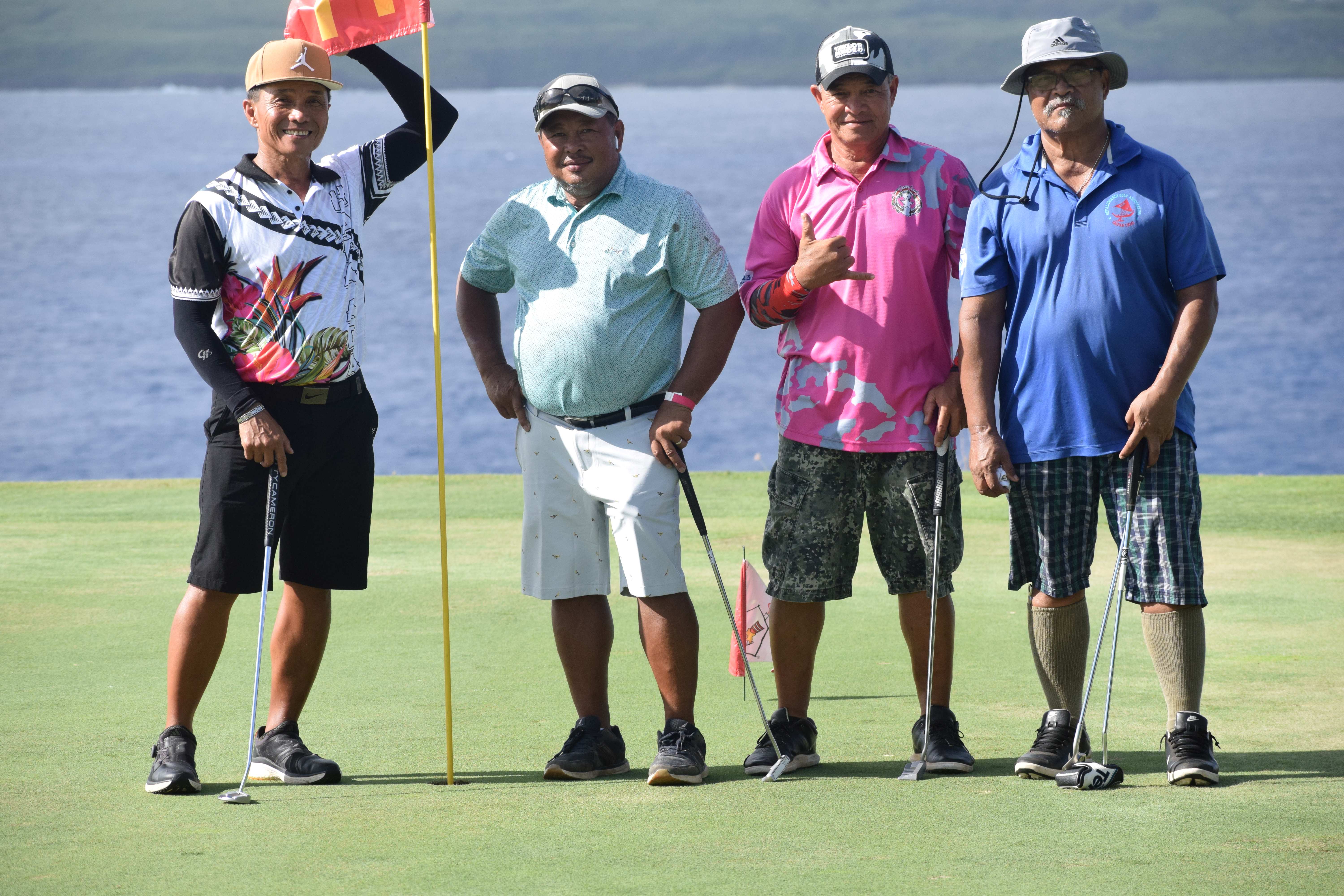 Senior Flight champion Joseph Sasamoto, left, with Rene Batallones, Joe Kamikaze Camacho, and Manny Mangarero.