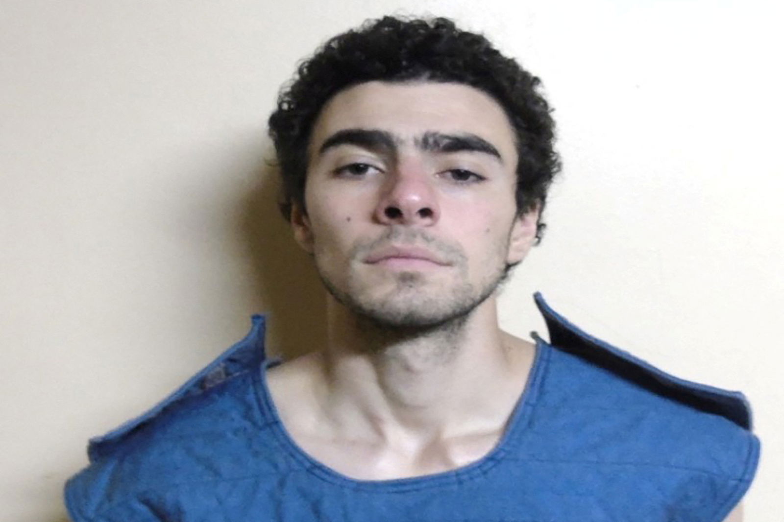 Luigi Mangione, 26, a suspect in the New York City killing of UnitedHealth executive Brian Thompson, poses for a booking photograph at State Correctional Institution Huntingdon in Huntingdon, Pennsylvania, Dec, 9, 2024. 