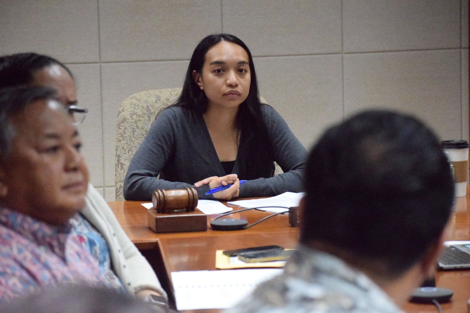 Dana Calvo, the acting Commonwealth Economic Development Authority board chair, listens to economic development manager David Guerrero as board members Michael Sablan, and Tania David, partly hidden, listen during a board meeting on Thursday in CEDA conference room in San Jose.Photo by Emmanuel T. Erediano