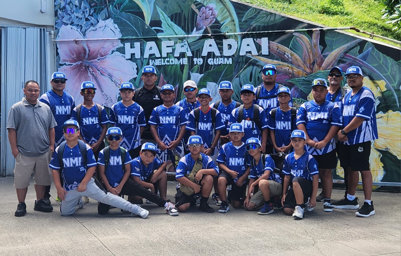 The NMI’s U12 Baseball Team members pose for a group photo after arriving on Guam to compete in the 2024 World Baseball Softball Confederation U12 Baseball qualifying tournament.