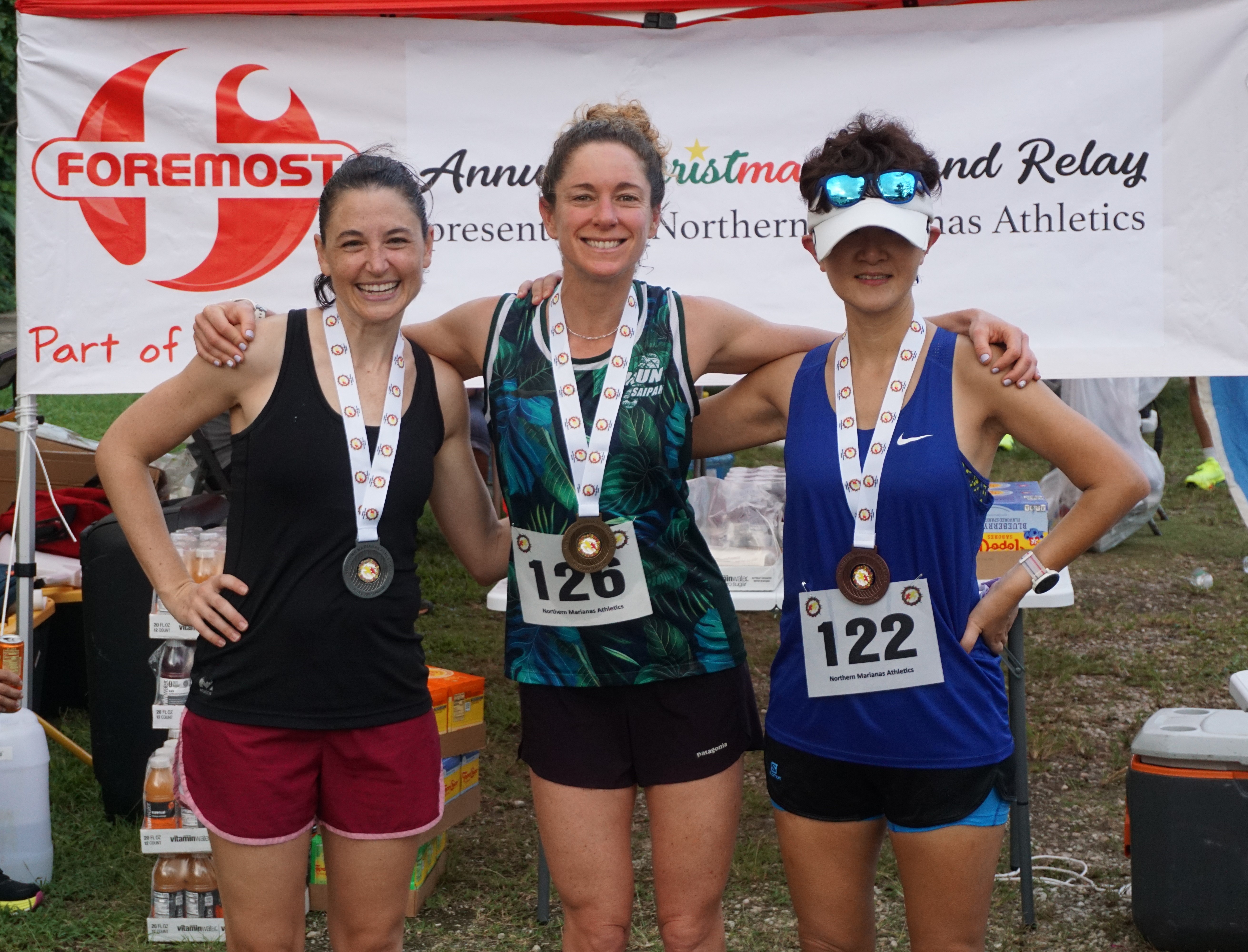 The top three women solo finishers: Heather Brook, Lily Muldoon, and Ann Bang.