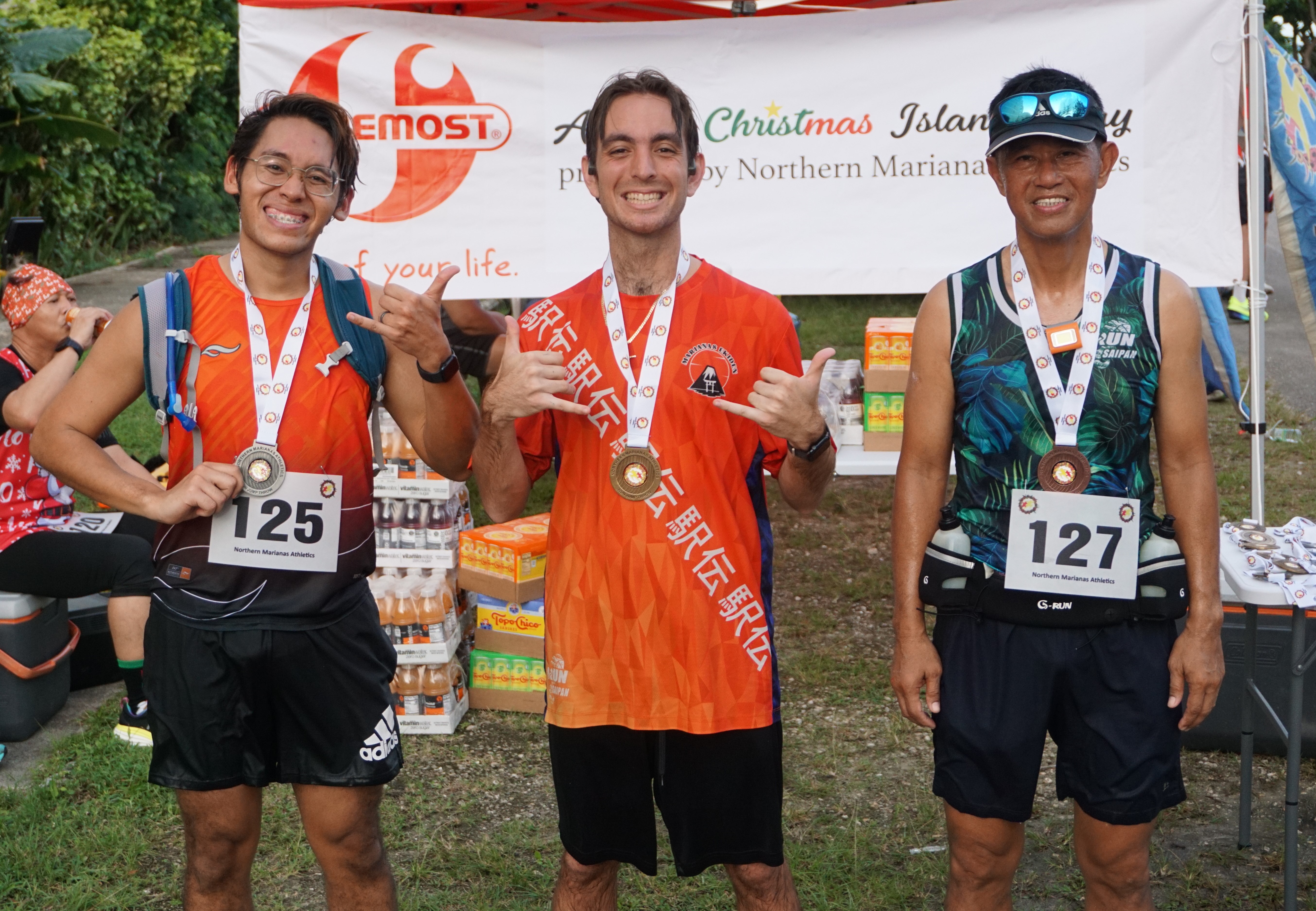 The top three men solo finishers: Philip Santos, Jordan Ruiz, and James Abuy.