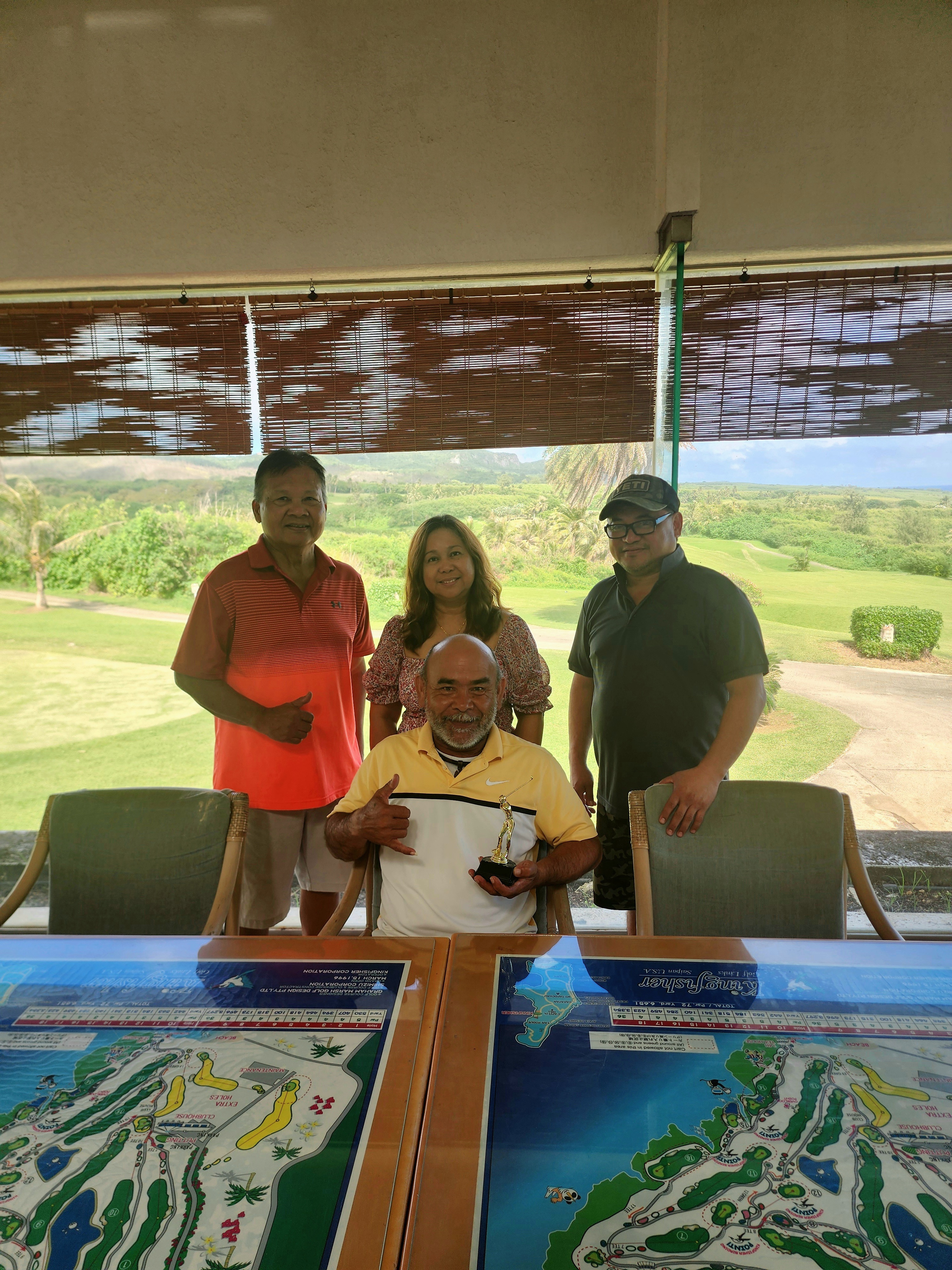 December Ace Anthony Tomokane, seated, with Joe Bermudes, Jo Camacho and Eddie Terlaje.