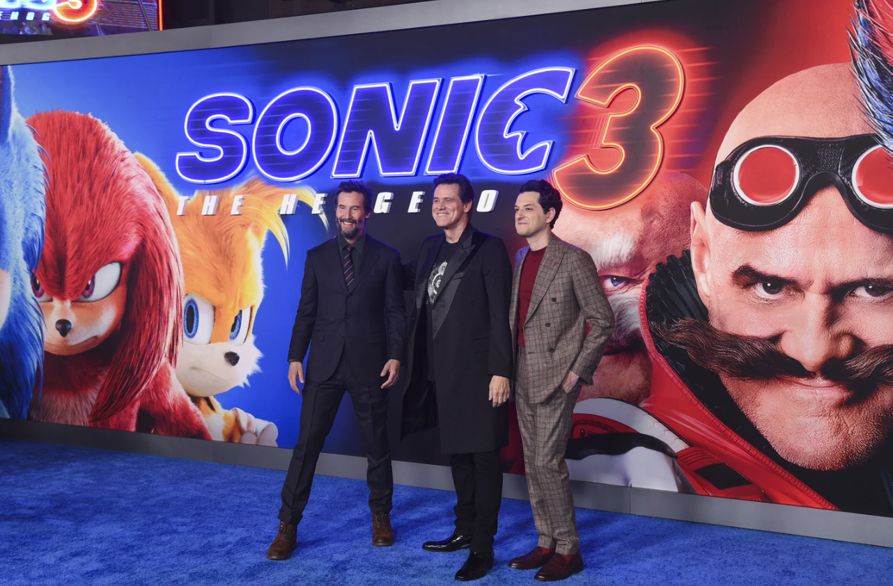 Keanu Reeves, from left, Jim Carrey and Ben Shwartz arrive at the premiere of “Sonic The Hedgehog 3” on Dec. 16, 2024 at TCL Chinese Theatre in Los Angeles.
