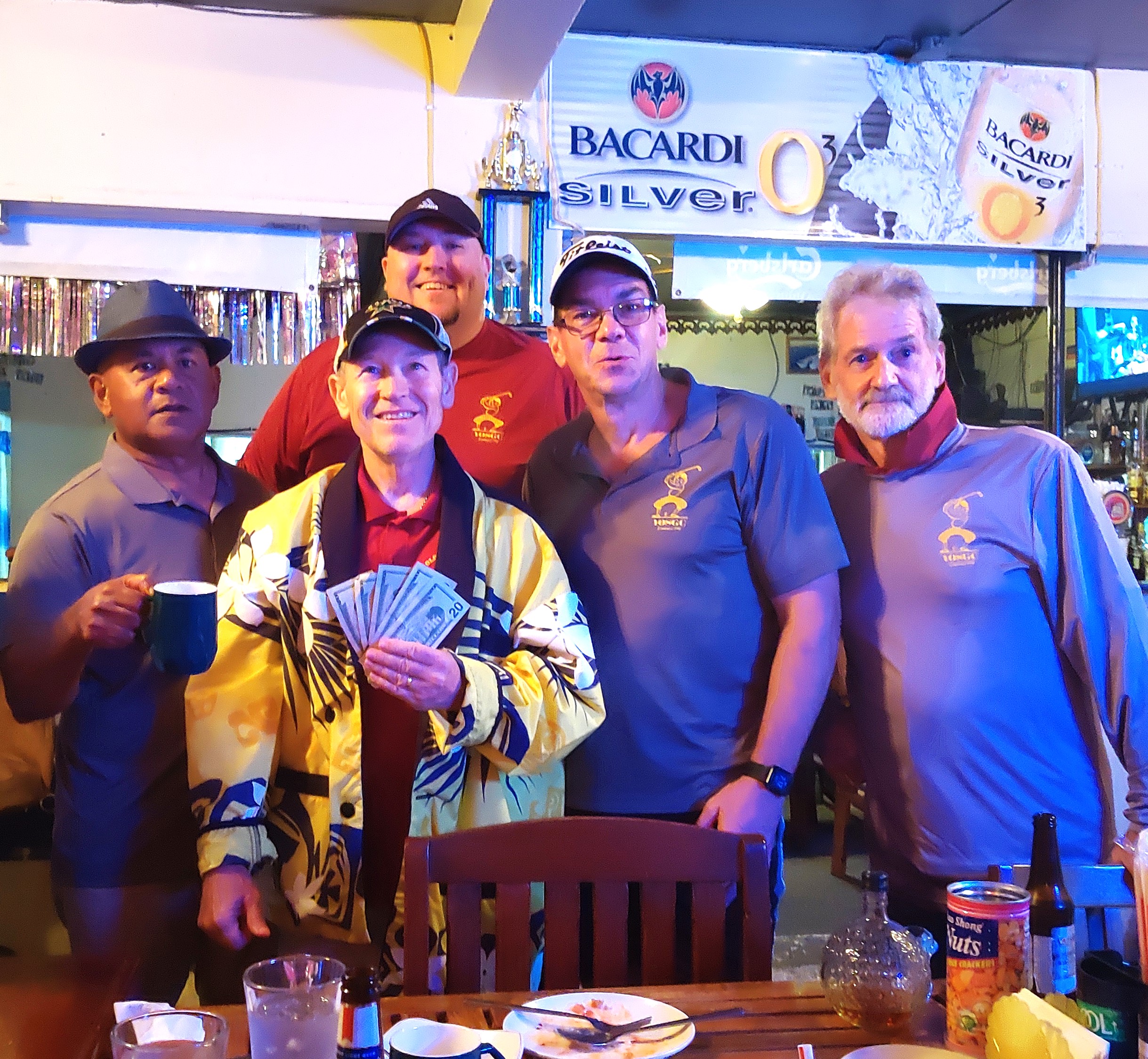 2024 champion Tex surrounded by past champs.