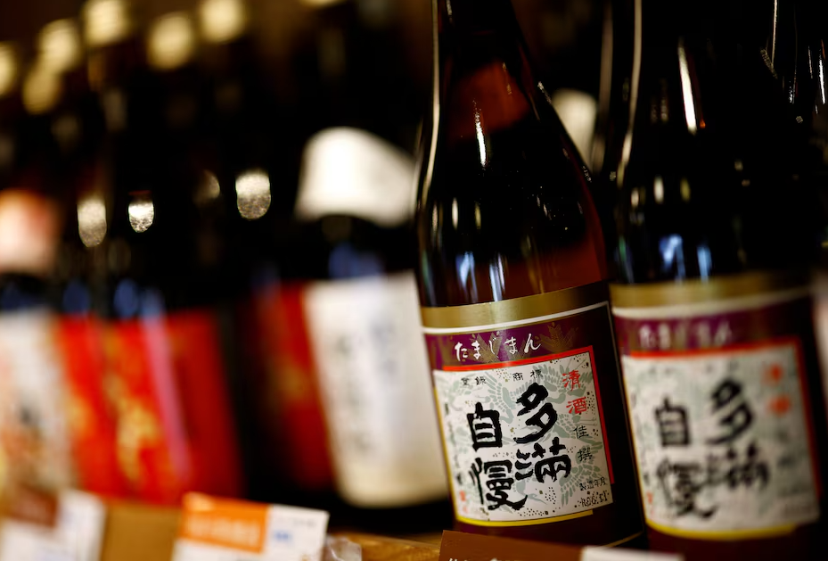 “Tamajiman” brand sake bottles produced by Ishikawa Shuzou, or Ishikawa Brewery, are displayed for sale at the brewery's sales store in Fussa, western portion of Tokyo, Japan, Nov. 25, 2024.