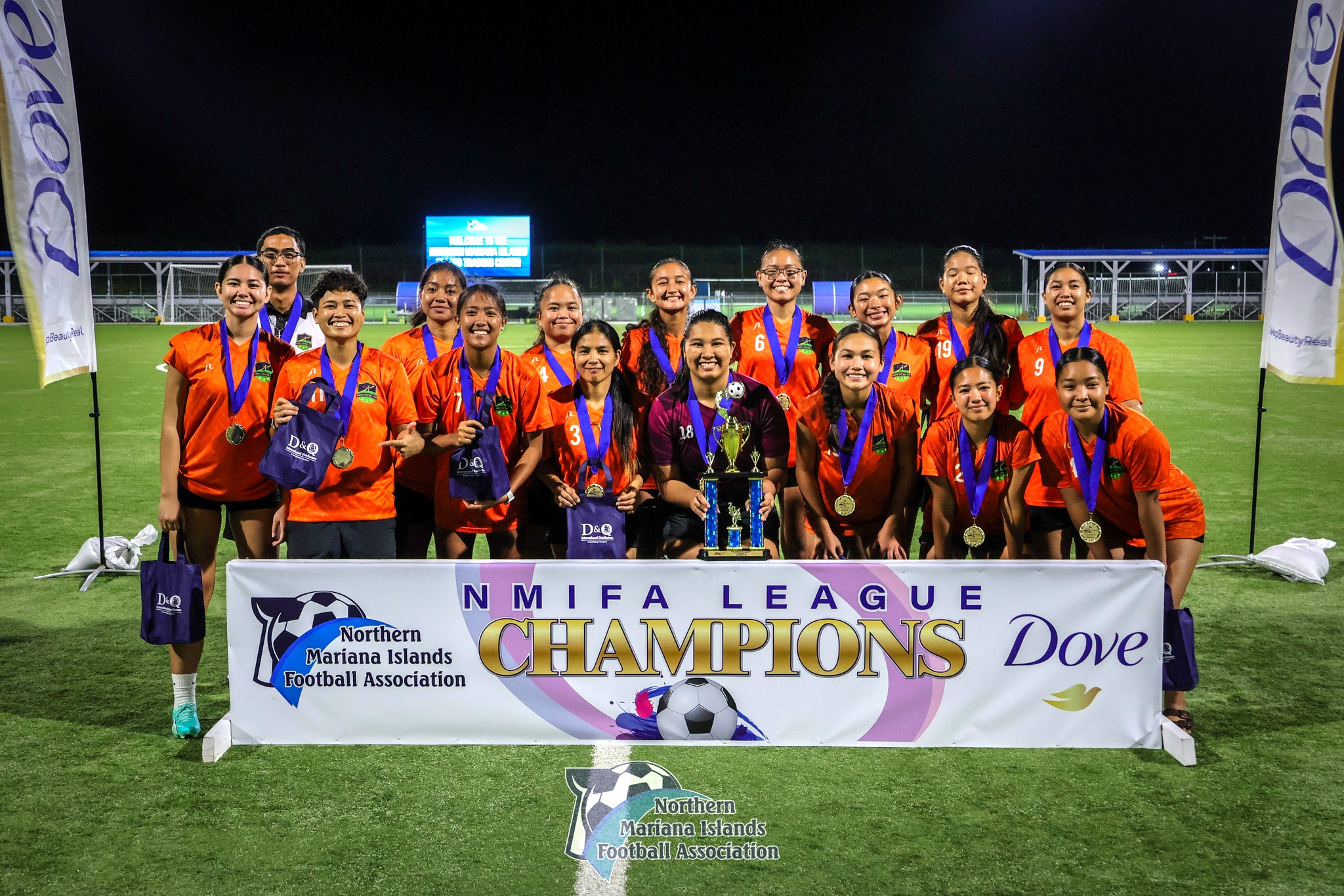 Kanoa Football Club players pose for a group photo with the championship trophy in the A division of the Dove Women's League Fall 2024 at the NMI Soccer Training Center in Koblerville on Sunday. 