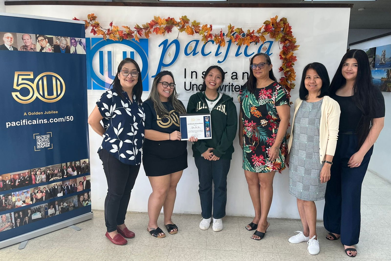 Shu Yi Cao with the staff of Pacifica Insurance