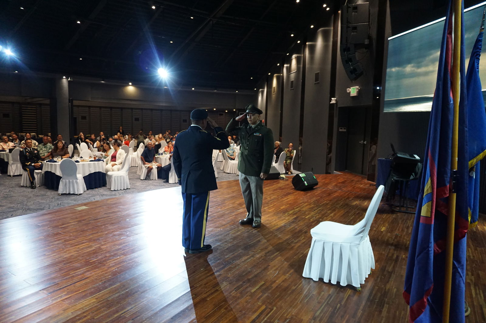 Sgt. Joshua Roberto salutes 2nd Lt. Franklin Babauta Jr.