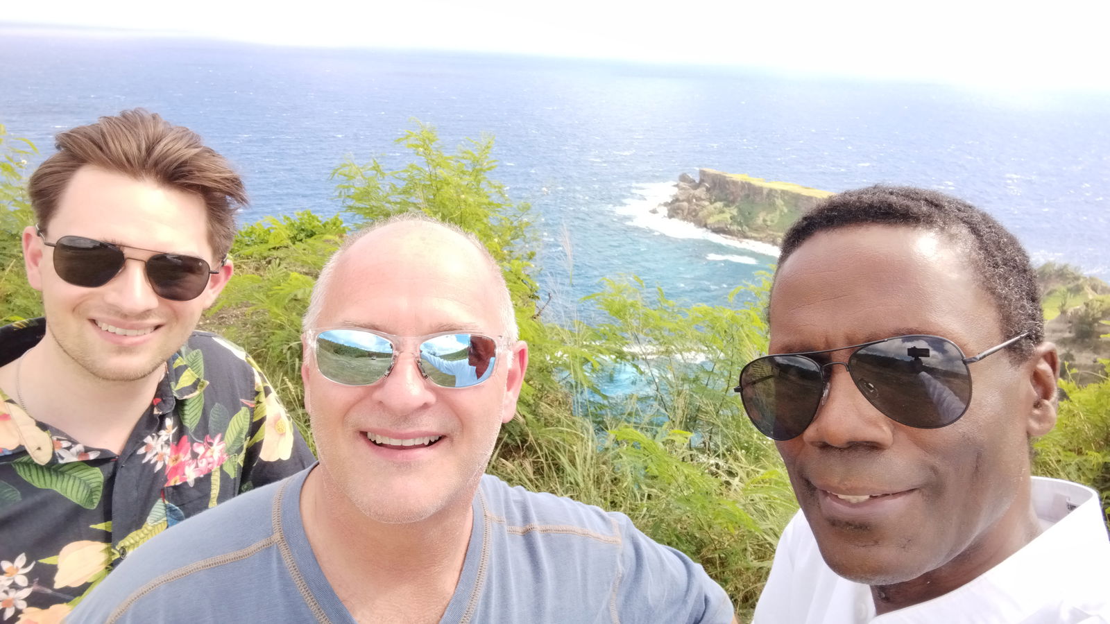 Griffin and Ken Sava discover the beauty and culture of the island with the author, Walt Goodridge.