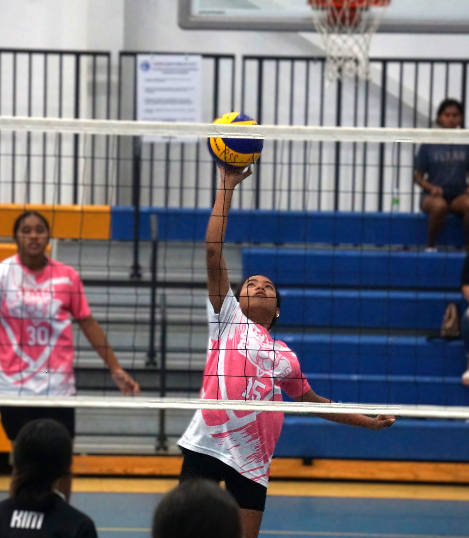 TMS' Kaleenamae Ada reaches out for the spike finish.