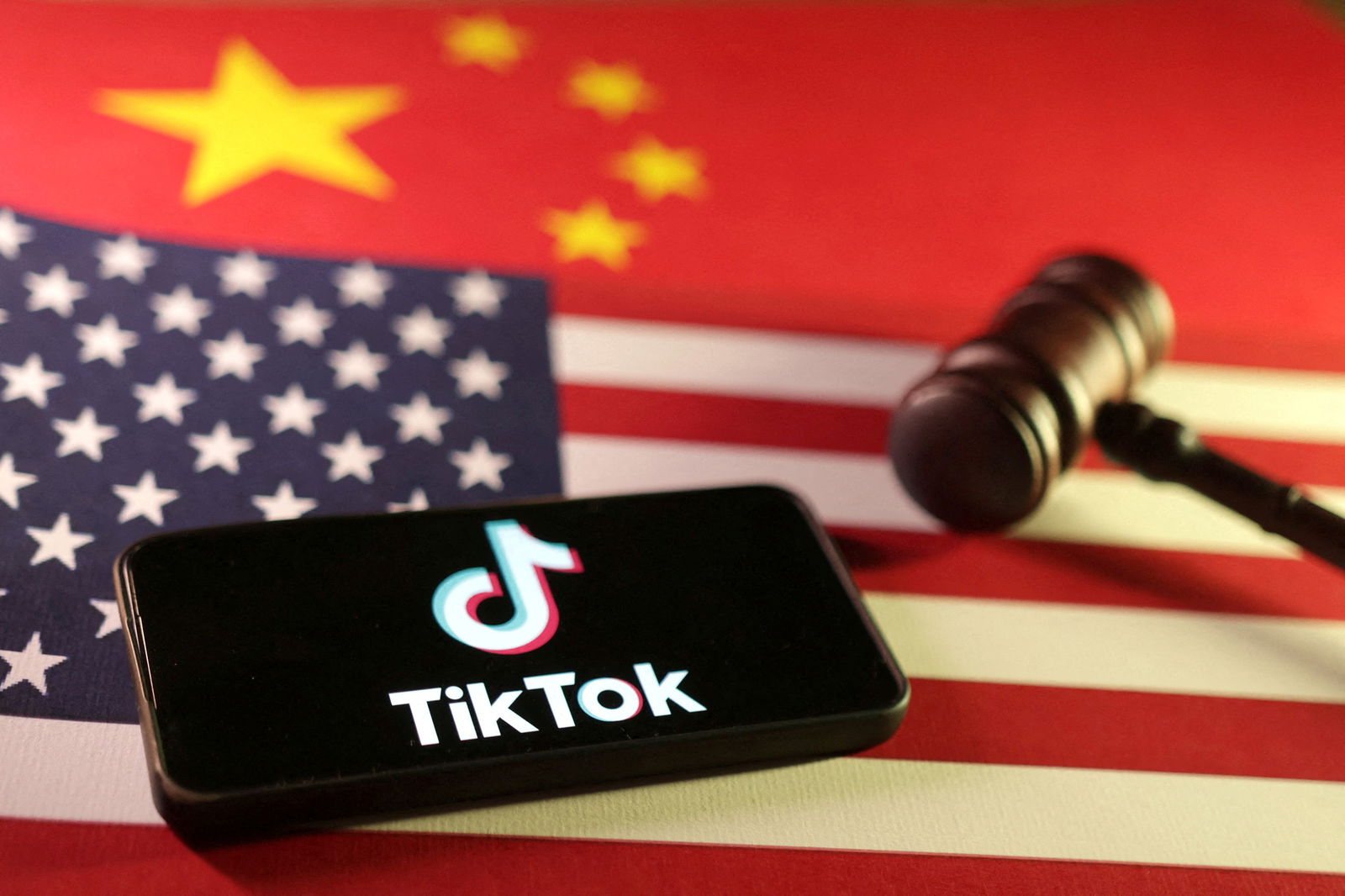 U.S., Chinese flags, TikTok logo and gavel are seen in this illustration taken Jan. 8, 2025.
