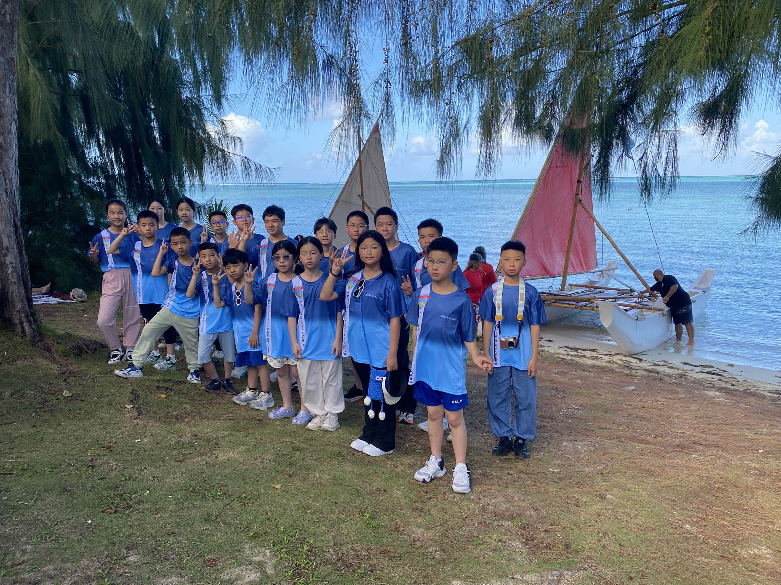 The visiting students of Fujian Quanzhou Brilliant Advancement Education pose for a photo before going on their lagoon ride with 500 Sails.