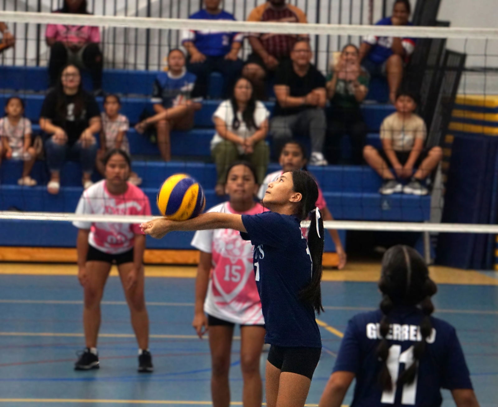 MCS' Eunyu Kwak sets up the play with a bump.