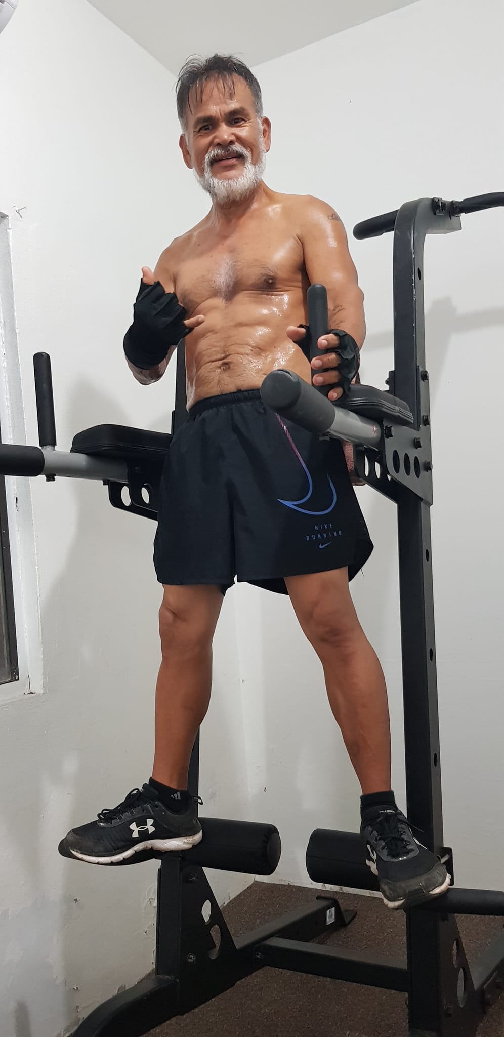 Fabian Indalecio works up a sweat at his mini-gym at home.                                                                                                     