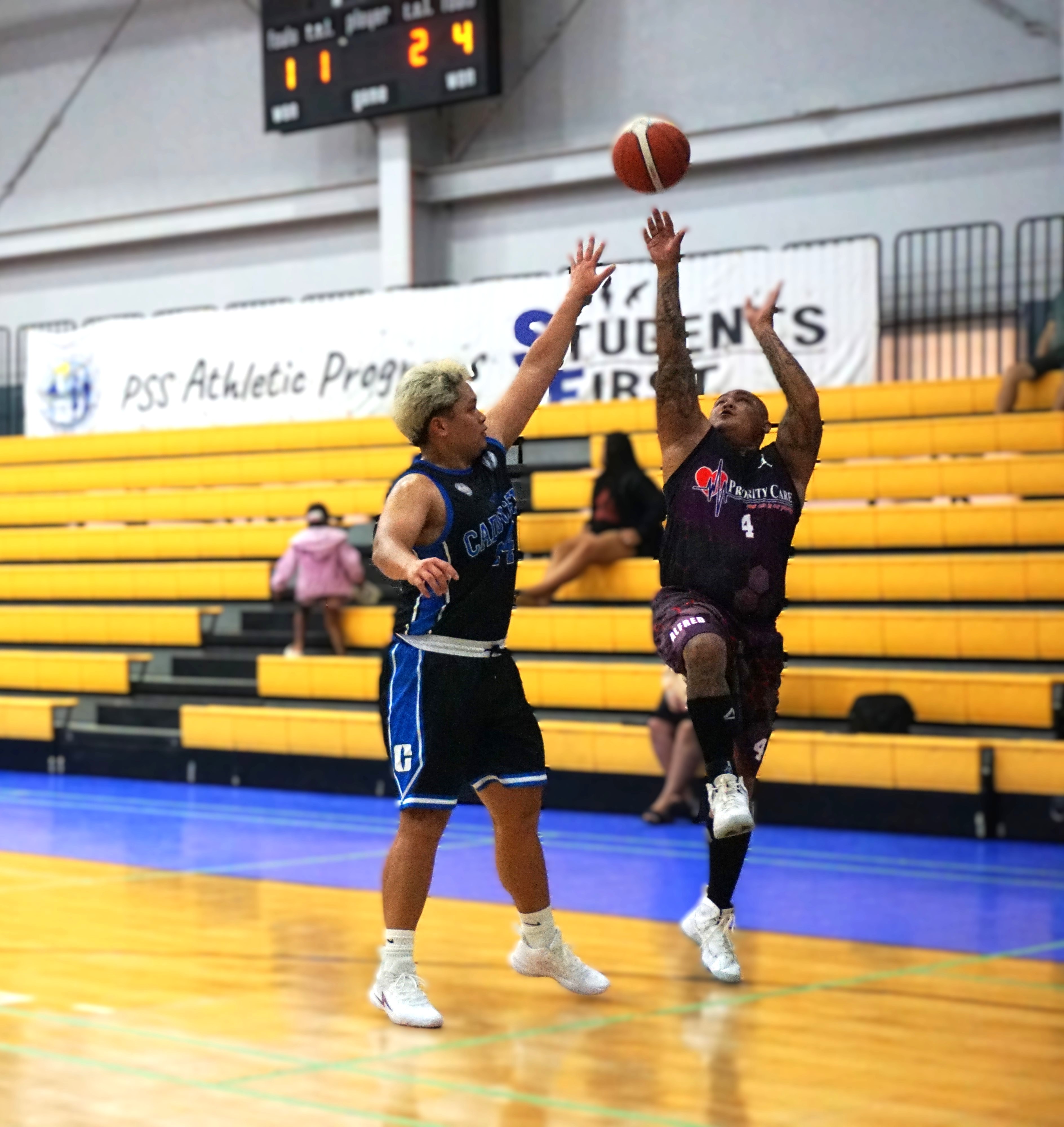 Priority Care's Alfred Manglona takes the one-legged three-pointer during a game against CHCC in the 2024 R&J Wine and Liquor Inter-Government/Business League at the Ada gym.