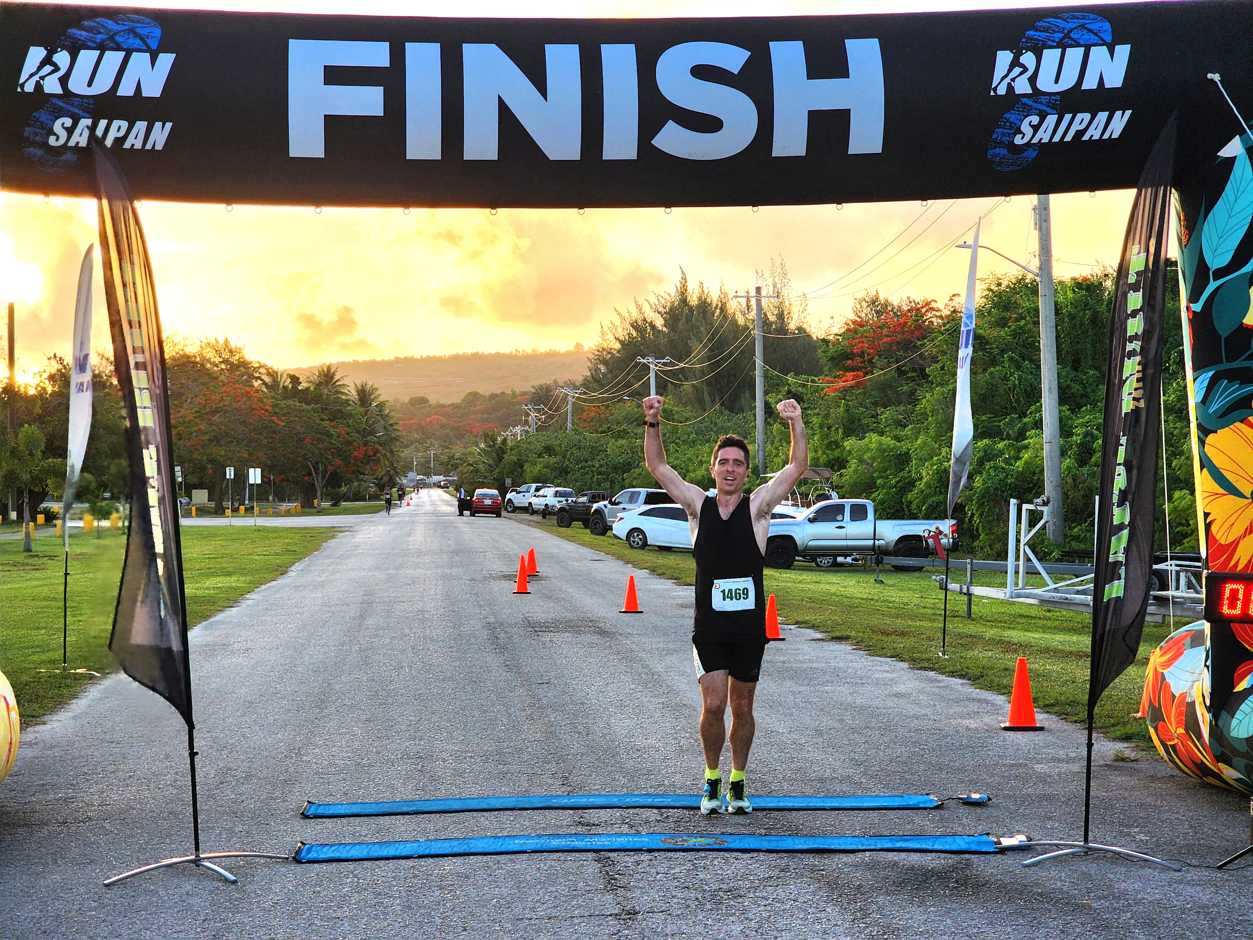 In this file photo, Jody O’Sullivan celebrates as he finishes first overall in Run Saipan’s 4th Annual 4th of July, Independence Day two-mile race in 2024.