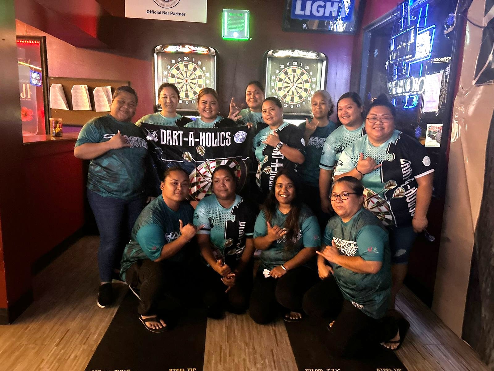 Bravo Dart A Holics and Chaotic Darty Hits pose for a photo after competing in a ladies division match of the 2024 SEDA Bud Light Dart League at Bravo Restaurant.