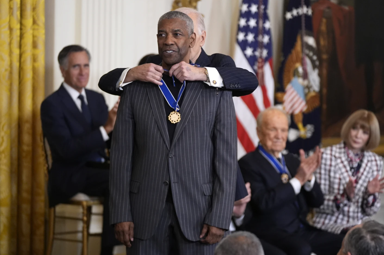President Joe Biden presents the Presidential Medal of Freedom to Denzel Washington in the East Room of the White House, Saturday, Jan. 4, 2025.