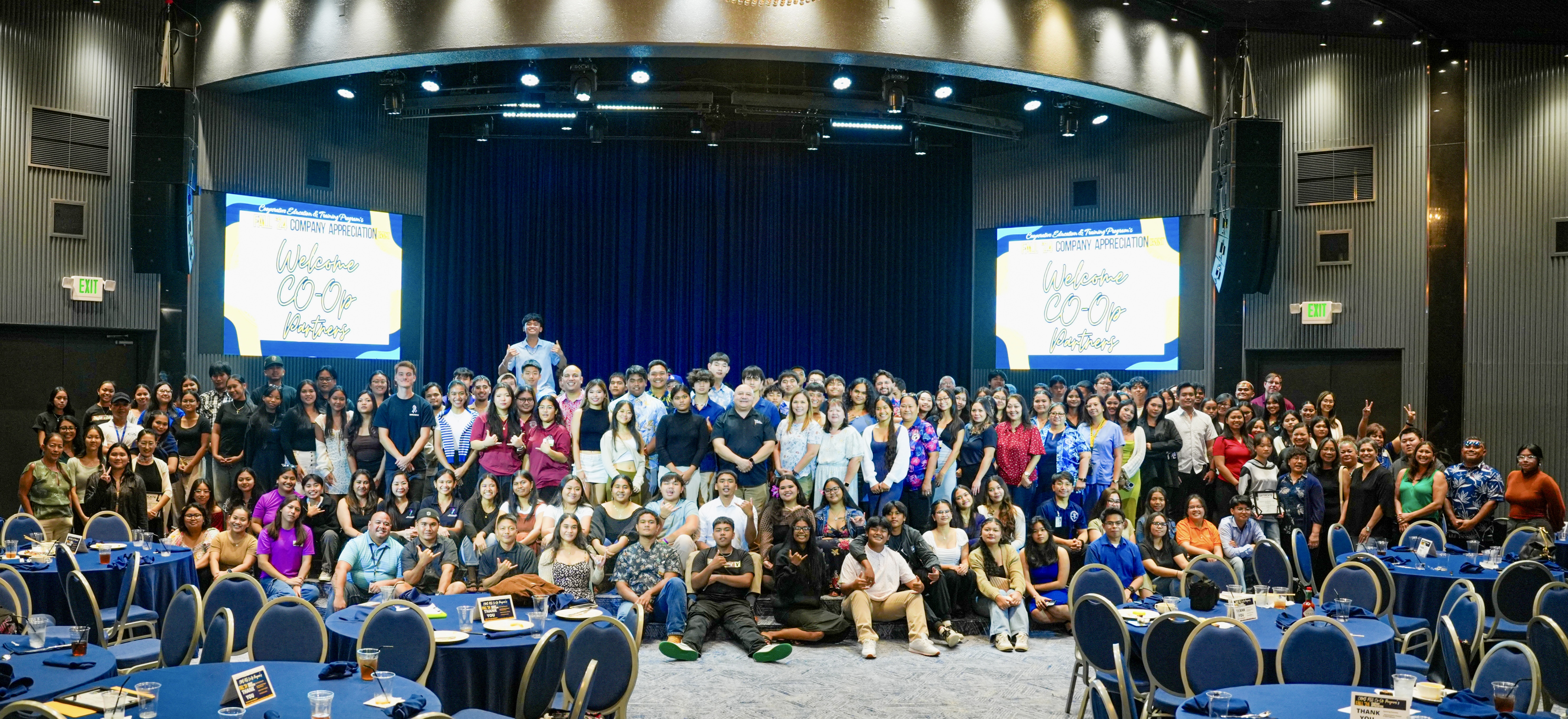 120 students pose for a photo with representatives of businesses and government agencies that hosted them for on-the-job training during the recently concluded Fall 2024 semester of the Public School System’s Cooperative Education Program in a ceremony at Kensington Hotel on Jan. 21, 2025. Also in photo are Commissioner of Education Dr. Lawrence F. Camacho, PSS Cooperative Education Program Coordinator Brandon Nicholas and Senior Director for Instructional Services Dr. Rizalina Liwag.PSS photo