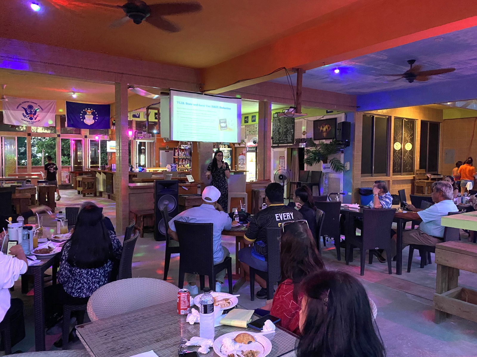 Tax attorney Tina Azarvand speaks at a workshop with business owners at Last Shot Bar in Chalan Kanoa on Tuesday, Jan. 7 