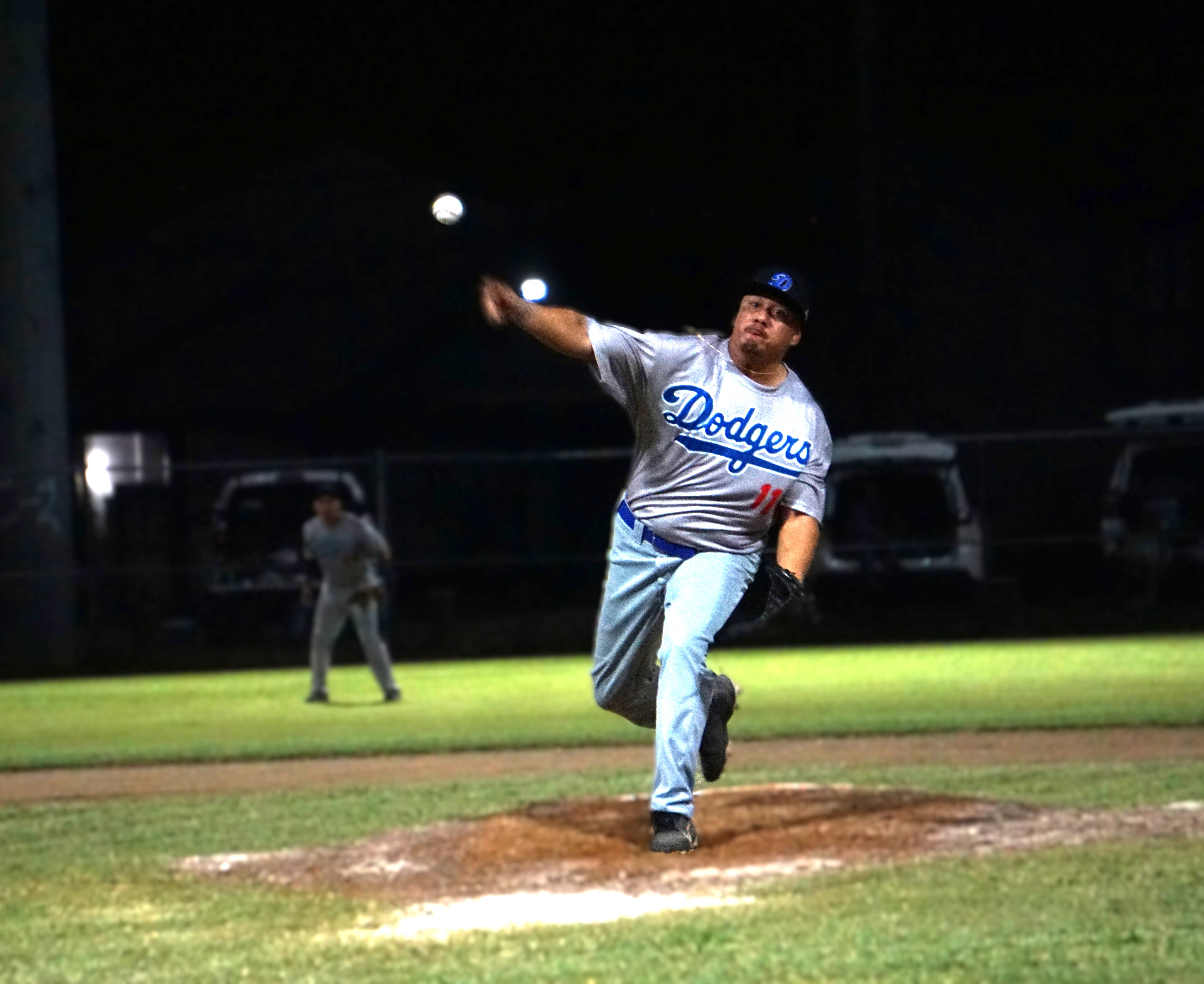 The Dodgers’ Geoffrey Cruz attempts a pitch during a 2024 SBL Masters League game at the Francisco “Tan Ko” Palacios Baseball Field.