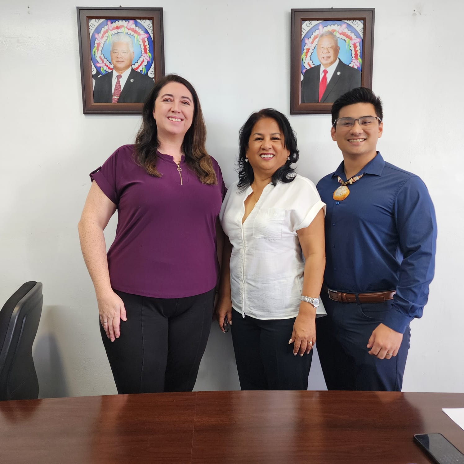 CNMI Department of Commerce Secretary Remedio C. Mafnas, center, Economic Recovery Corps fellow Carina Boston Pinales, left, and CNMI Registrar John David A. Reyes pose for photo after an interview with Variety on Tuesday.