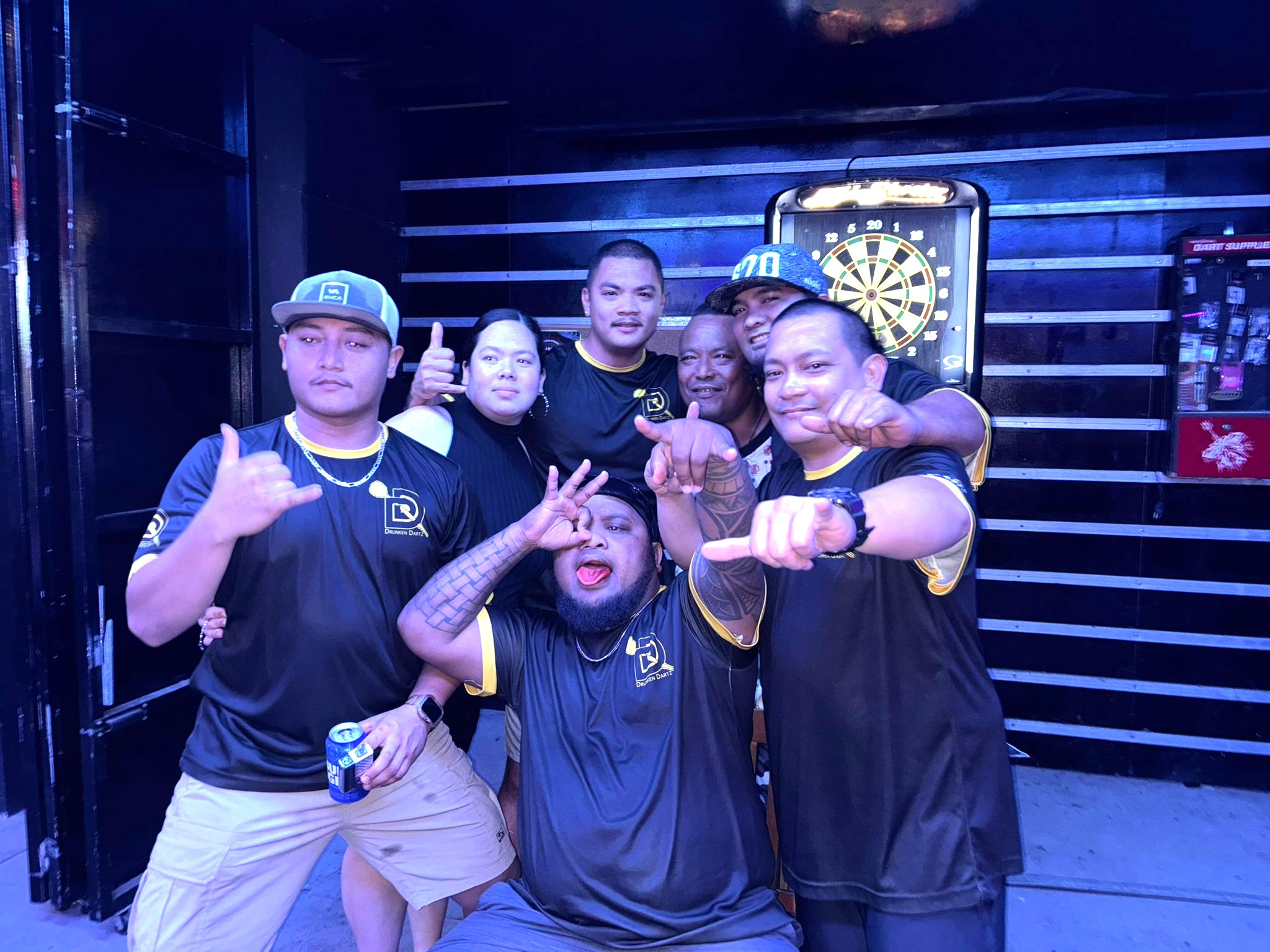 Bourbon Drunken Dart players pose for a group photo after claiming the A Division Bud Light Cup of the 2024 SEDA Bud Light Dart League on Monday at Bourbon Street Bar & Café.