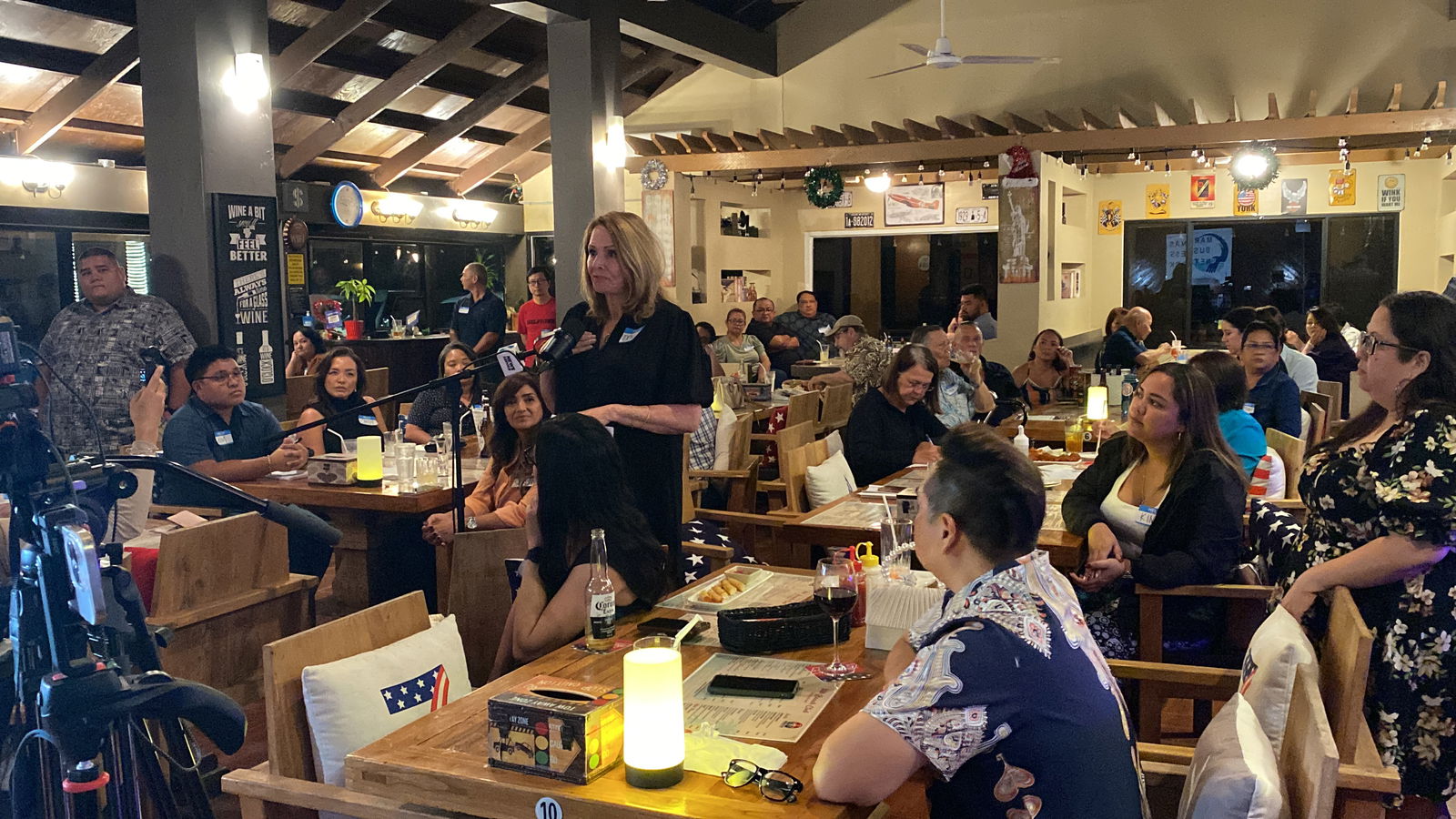 Donna Krum of Paradise Dental Spa speaks at the Marianas Business Network dialogue with the governor at the 360 Beach Club in Susupe on Friday.