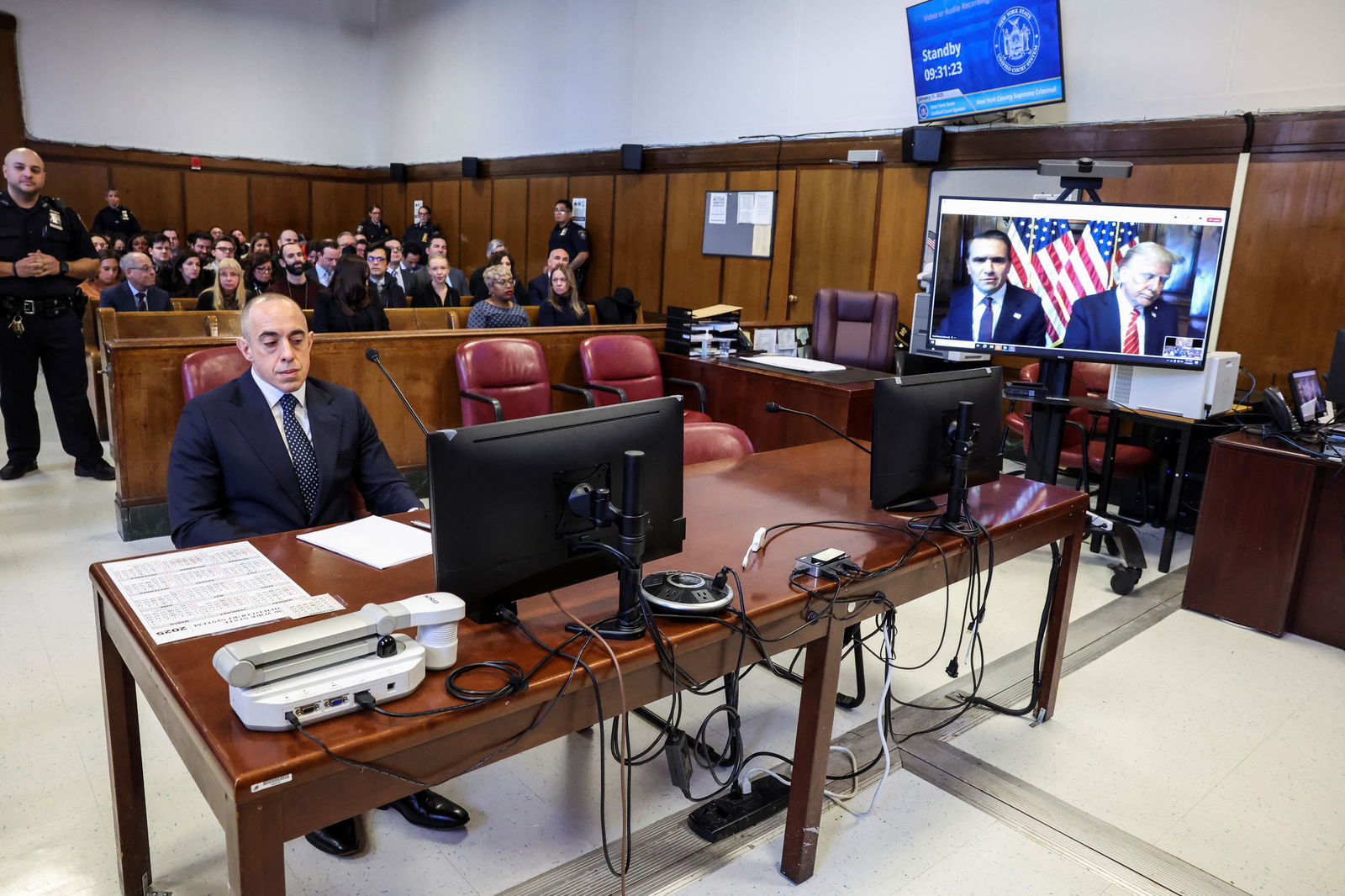 Attorney Emil Bove looks on as President-elect Donald Trump appears remotely for a sentencing hearing in front of New York State Judge Juan Merchan in the criminal case in which he was convicted in 2024 on charges involving hush money paid to a porn star, at New York Criminal Court in Manhattan in New York City, Jan. 10, 2025.
