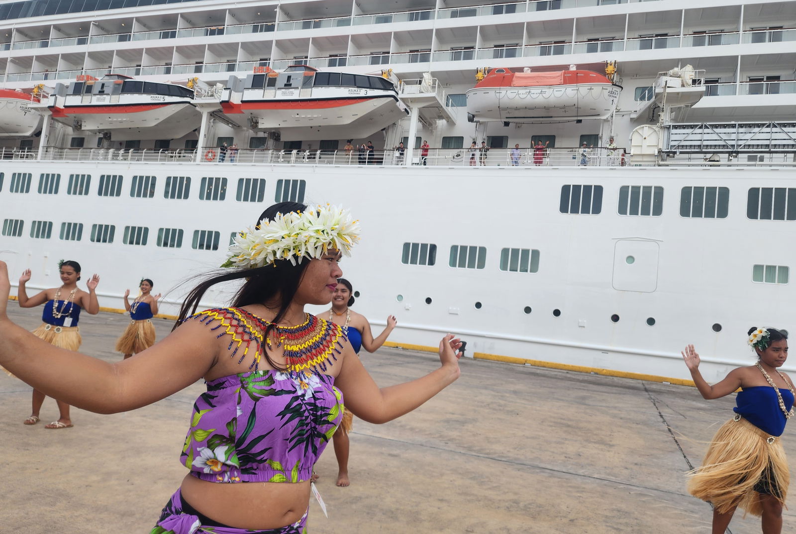 Chamorro and Carolinian dancers perform a special number for the crew and passengers of Asuka II at the port of Saipan on Tuesday morning, Dec. 31, 2024.
