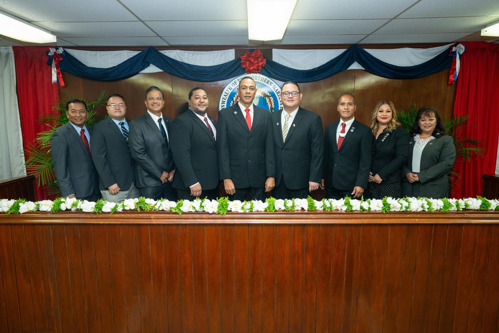 The newly sworn in members of the 24th Senate pose for a group photo.