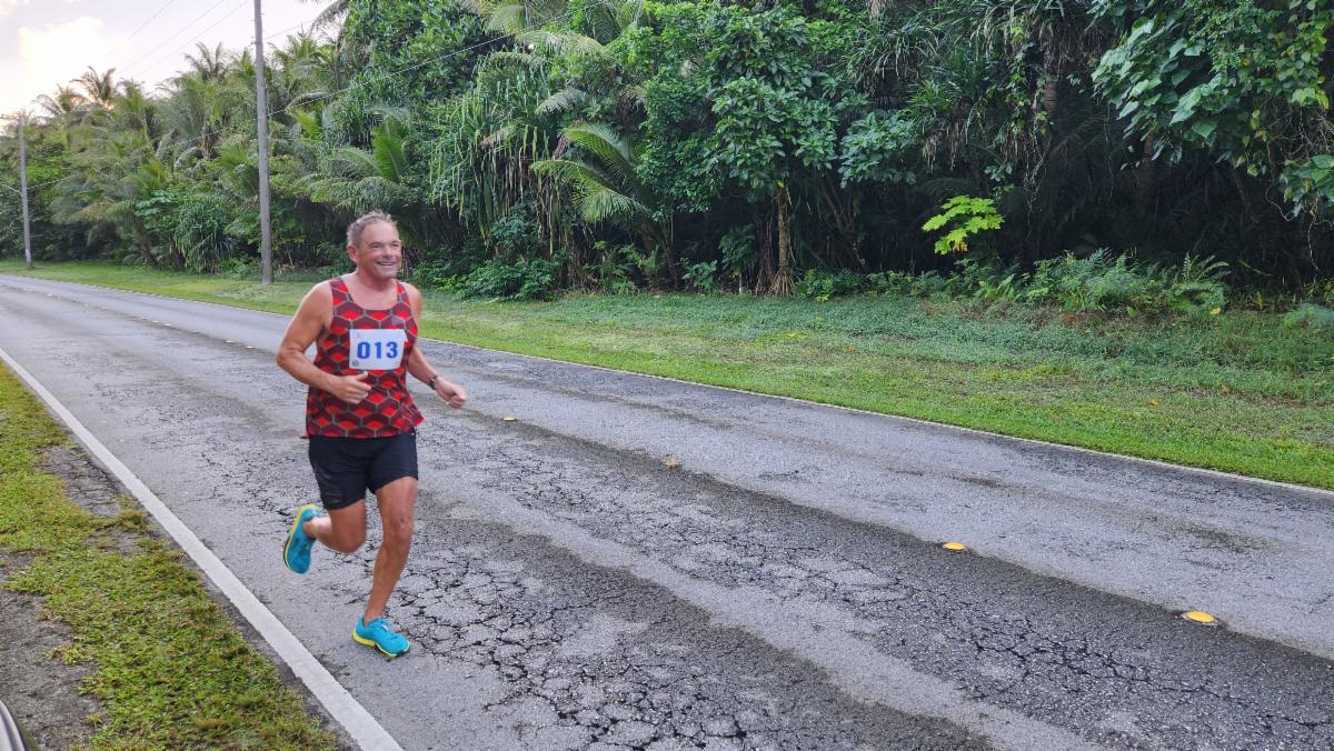 Men’s Division 1st place finisher James Munnis counts down the final few miles of the 2nd Annual Rota Marathon on Jan. 18, 2025.