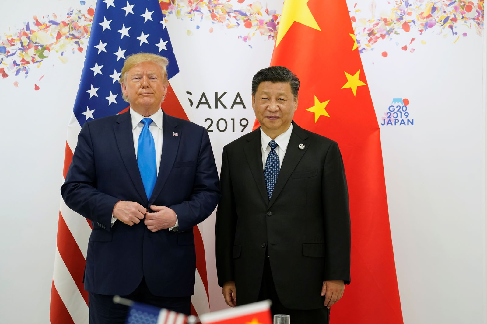 President Donald Trump poses for a photo with his Chinese counterpart, Xi Jinping, before their bilateral meeting during the G20 leaders summit in Osaka, Japan, June 29, 2019.