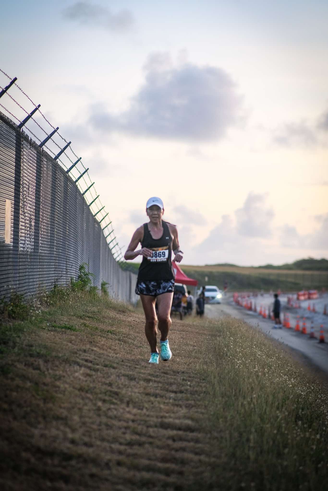 Akiko Miller runs along the trail of Run Saipan’s 4th Annual Saipan International Airport Trail Run course on Sunday morning.