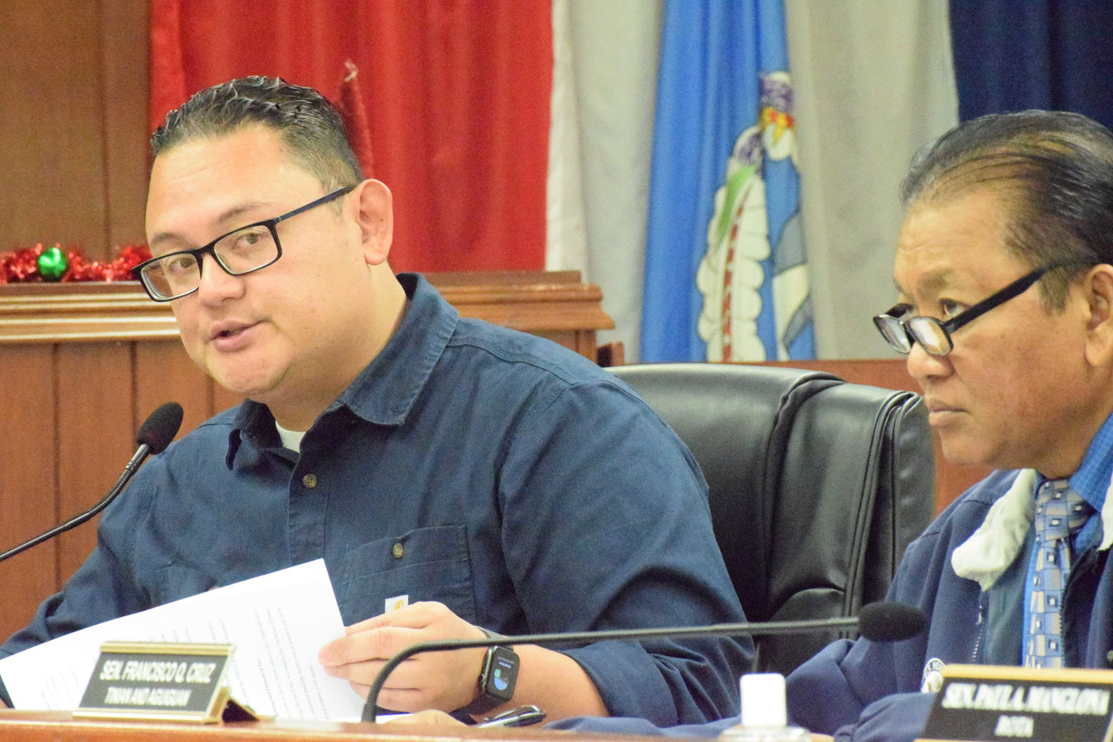 Senate Vice President Donald M. Manglona, left, speaks, as Sen. Frank Q. Cruz looks on during the Senate’s sine die session on Friday.