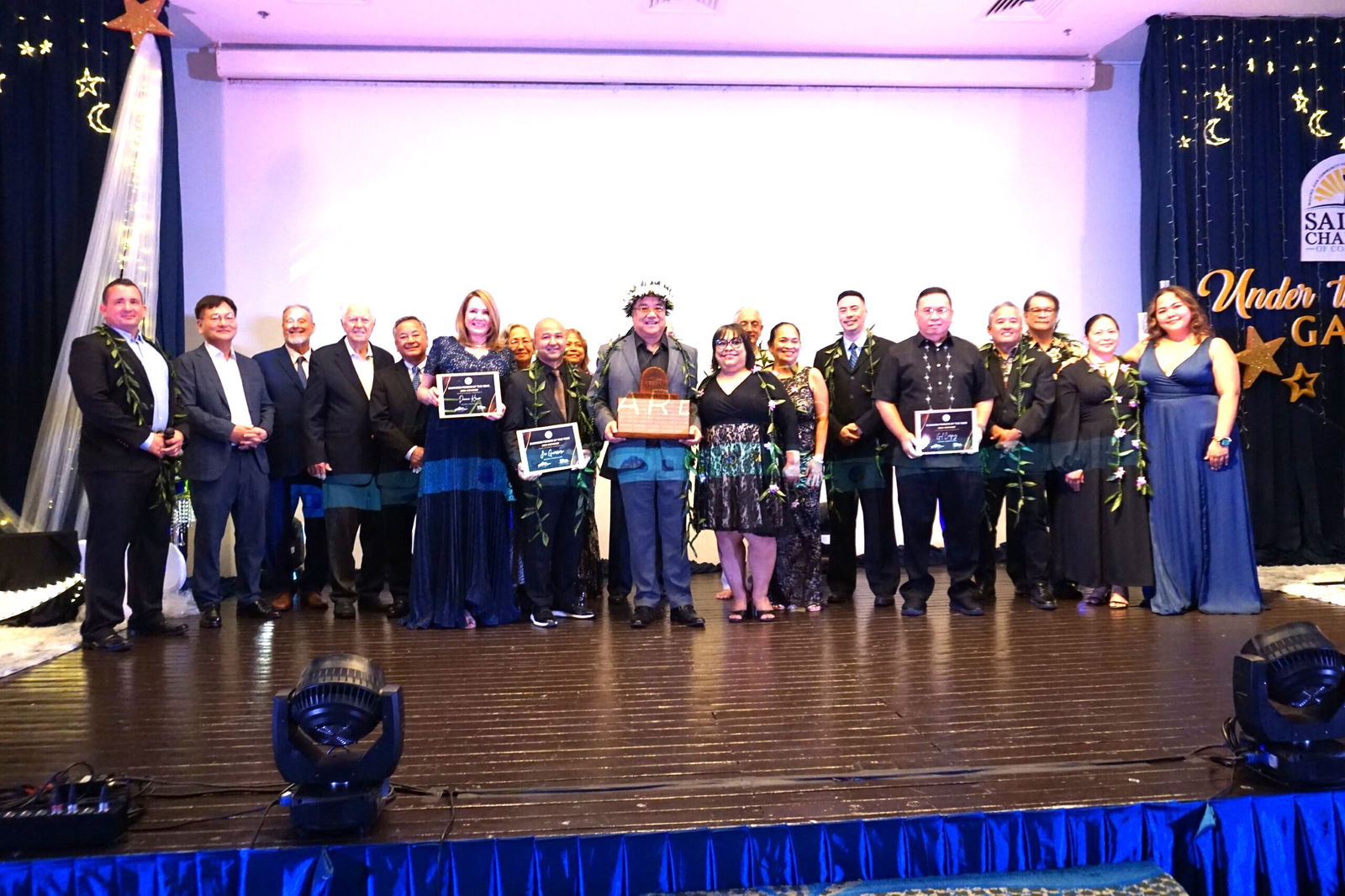 Frank Ada, center, is the 2024 Saipan Chamber of Commerce Business Person of the Year.
