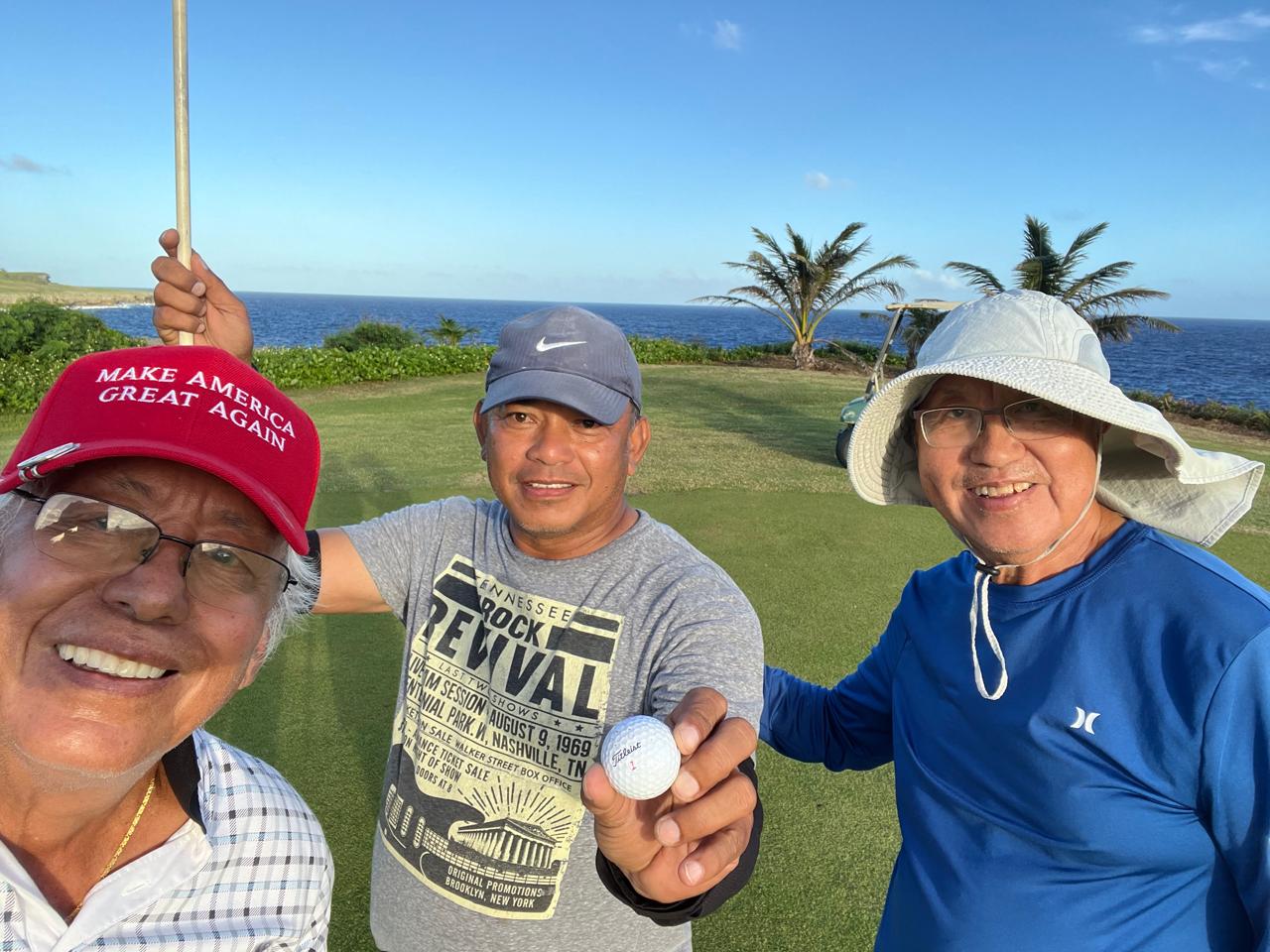 Former Speaker Rafael Demapan, center, makes a hole-in-one shot at Kingfisher Golf Links.  The amazing shot was witnessed by former Sen. Pete P. Reyes, left, and Alfred Yue.  Demapan teed on hole 6 with a distance of 93 yards. When he hit his ball, it bounced twice and then went straight to the hole.  In appreciation of their group’s loyalty and continued support for Kingfisher, Demapan will be awarded with a hole-in-one trophy and a golf certificate.  Practice makes perfect!