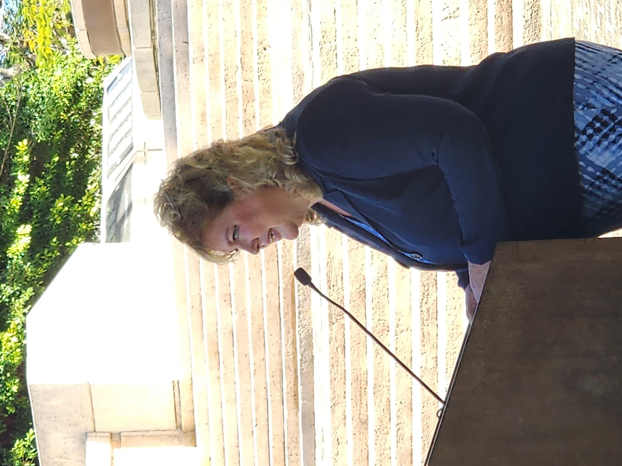 USCIS Seattle District Office Director Leanne Leigh delivers her remarks.