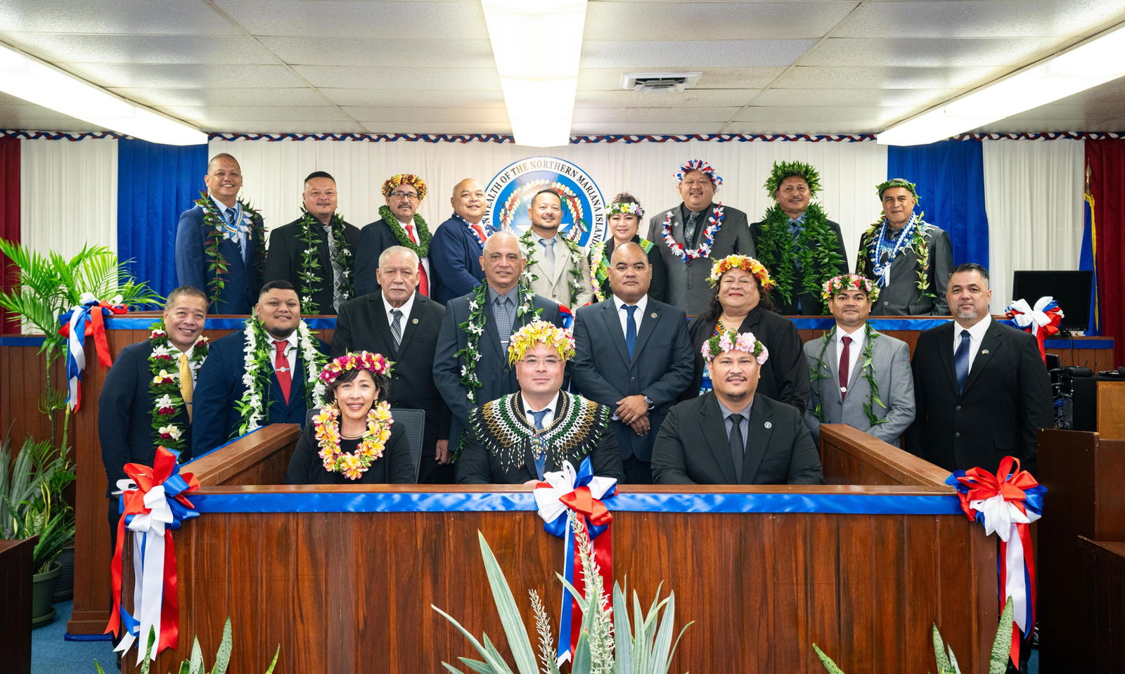 The newly sworn in members of the 24th House of Representatives pose for a group photo.