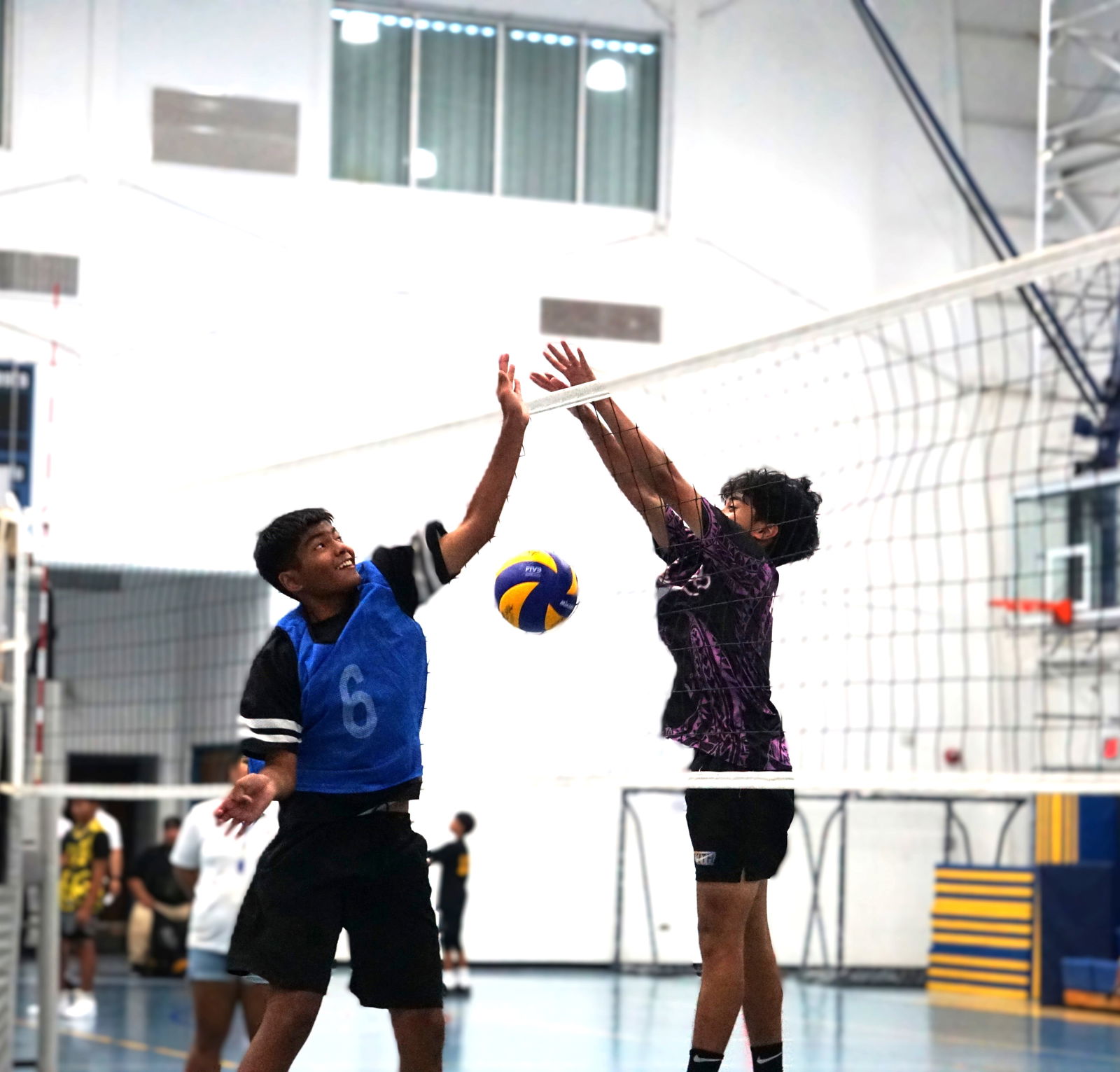 Francisco M. Sablan Middle School's Jairus Pangelinan denies the return during a match against Dandan Middle School in the boys middle school division of the PSS-NMIVA Interscholastic Volleyball League SY24-25 at the MHS gym on Tuesday.