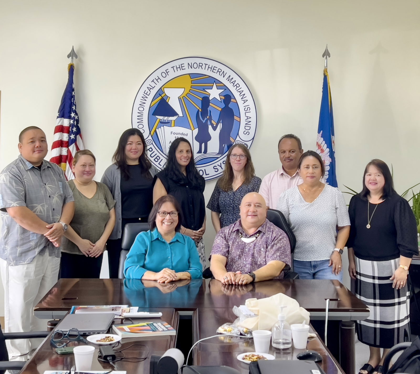Commissioner of Education Dr. Lawrence F. Camacho, seated, right, with educator Dr. Rita A. Sablan, a former commissioner of education, and members of the U.S. Department of Education’s Comprehensive Centers Network for Region 13 (Pacific 2): Public School System officials Dr. Rizalina Liwag and Dr. Yvonne R. Pangelinan, Federal Programs Officer Jacqueline Che, Career & Technical Education Program Director Dr. Jessica B. Taylor, and Associate Commissioner for Administration Eric Magofna with Mid-continent Research for Education and Learning’s  Susan Shebby, Sinton Soalablai, and Erin D’ Amelio.PSS photo