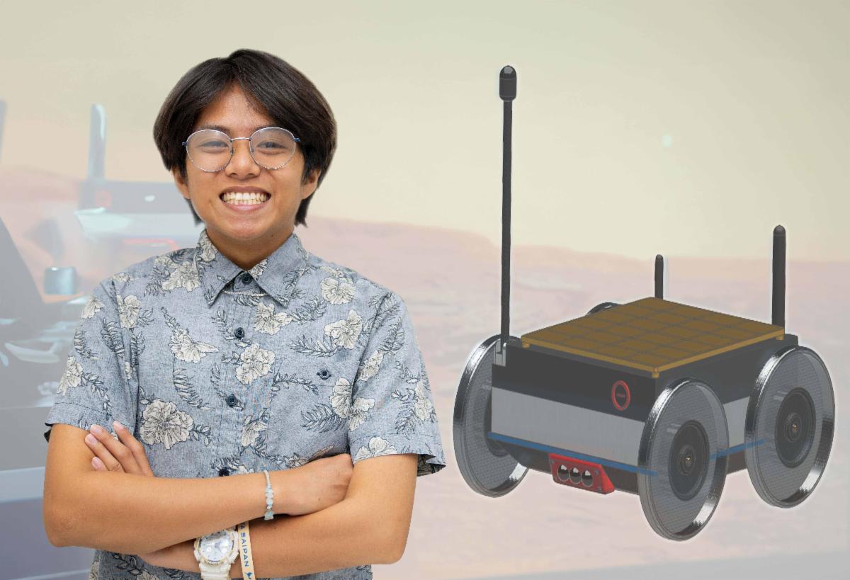 Dan Salde, NASA Community College Aerospace Scholars 2024 intern and Northern Marianas College student, poses next to his Lunar Robotic Rover designed with a 3D Computer Aided Software during his internship.