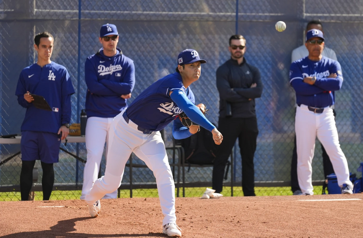 Los Angeles Dodgers two-way player Shohei Ohtani throws in the bullpen during spring training Tuesday in Phoenix.