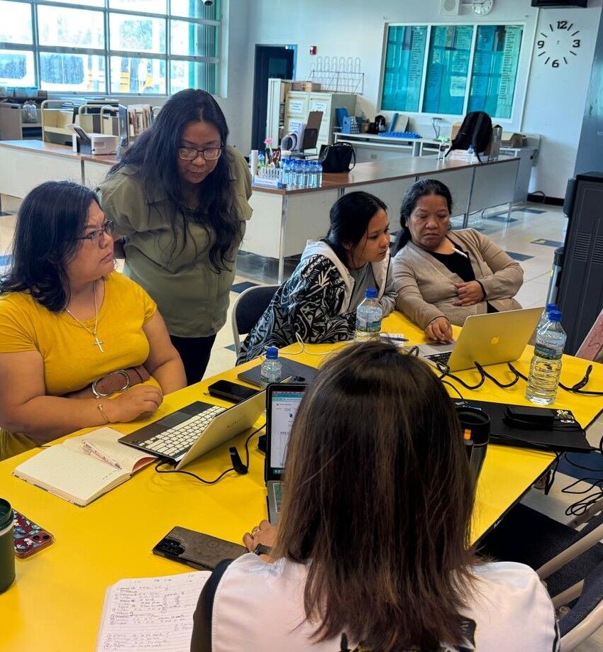 Dr. Lorraine Catienza,  Instructional Technology and Distance Education Program director, with Sinapalo Elementary School teachers and University of Guam-CEDDERS’ Jun De Leon.