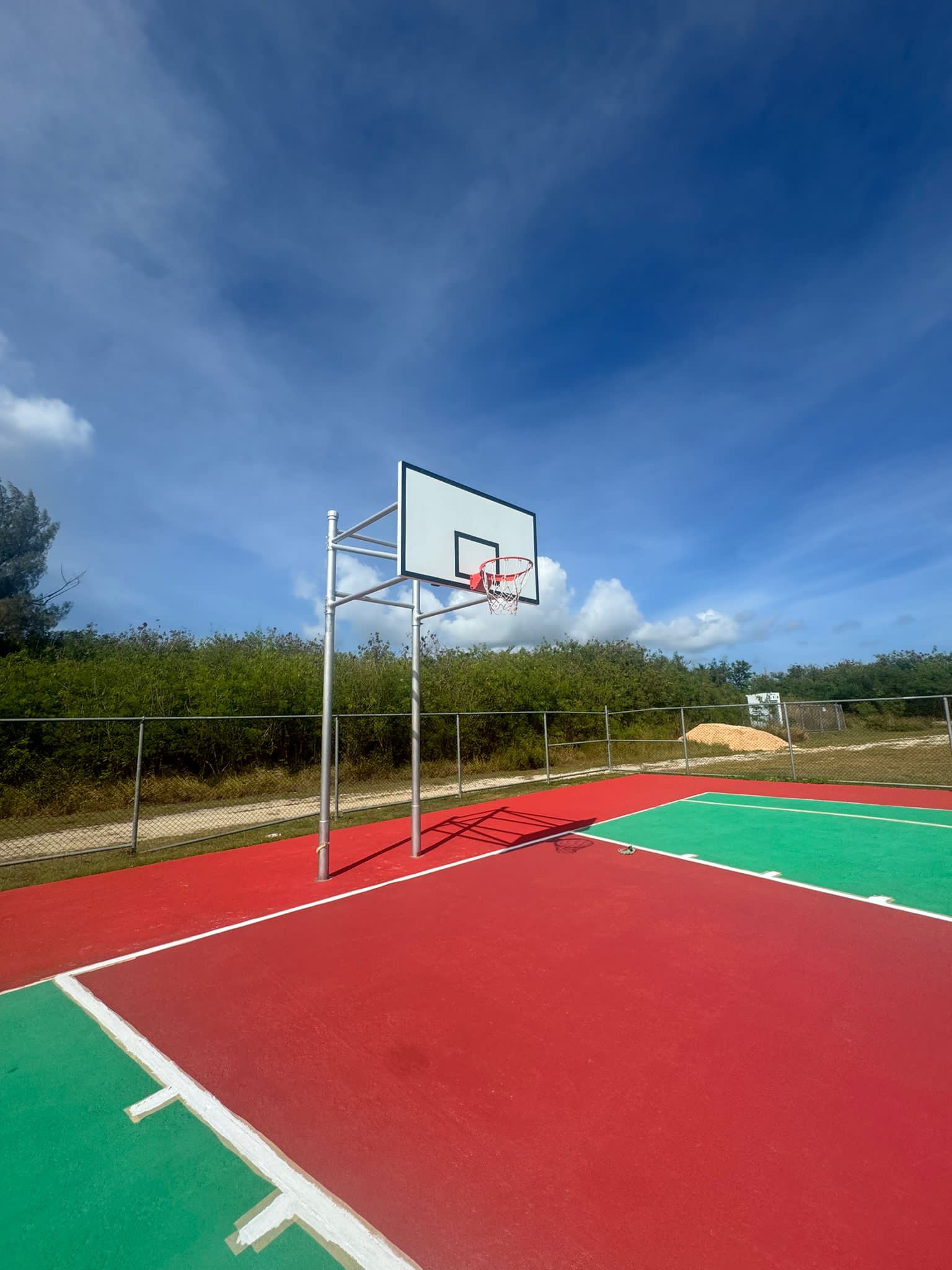 The Koblerville basketball court was renovated by Han Nam Supermarket.